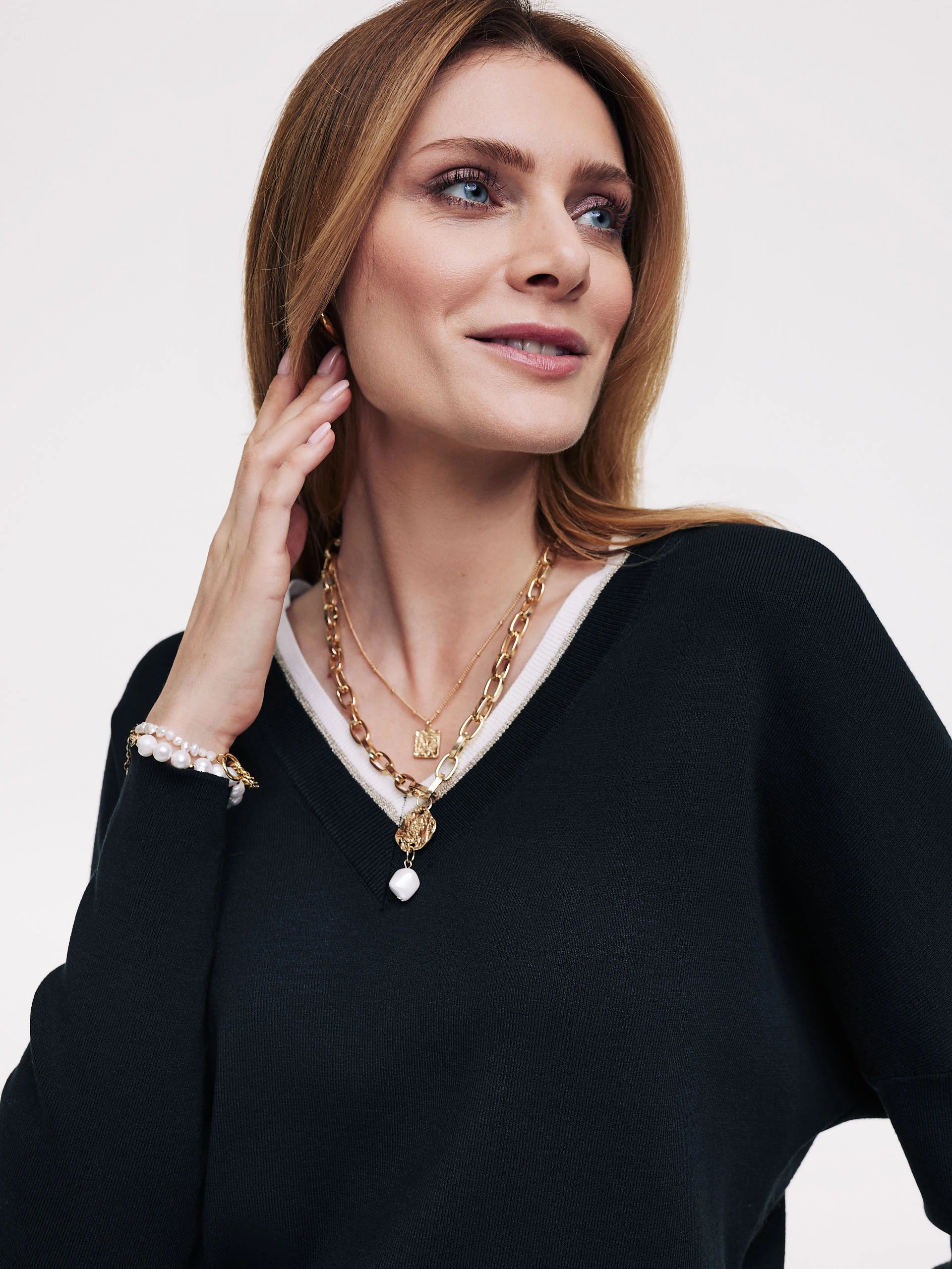 Navy blue sweater with metallic threads