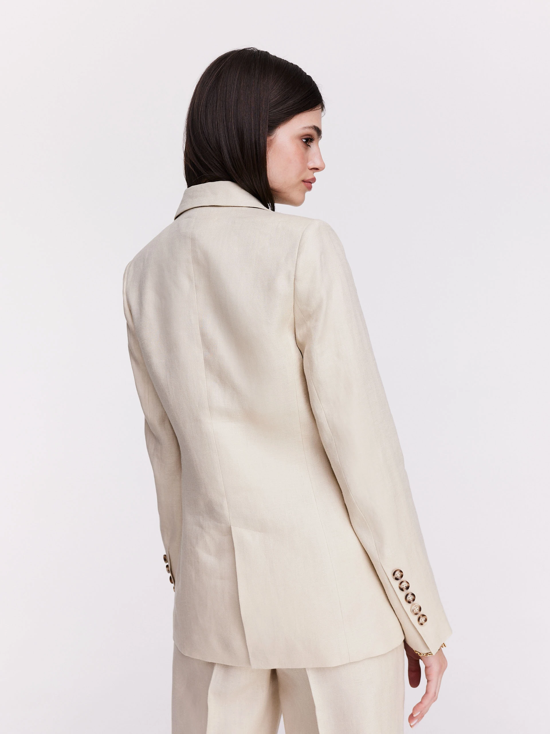 Beige linen jacket with a classic cut