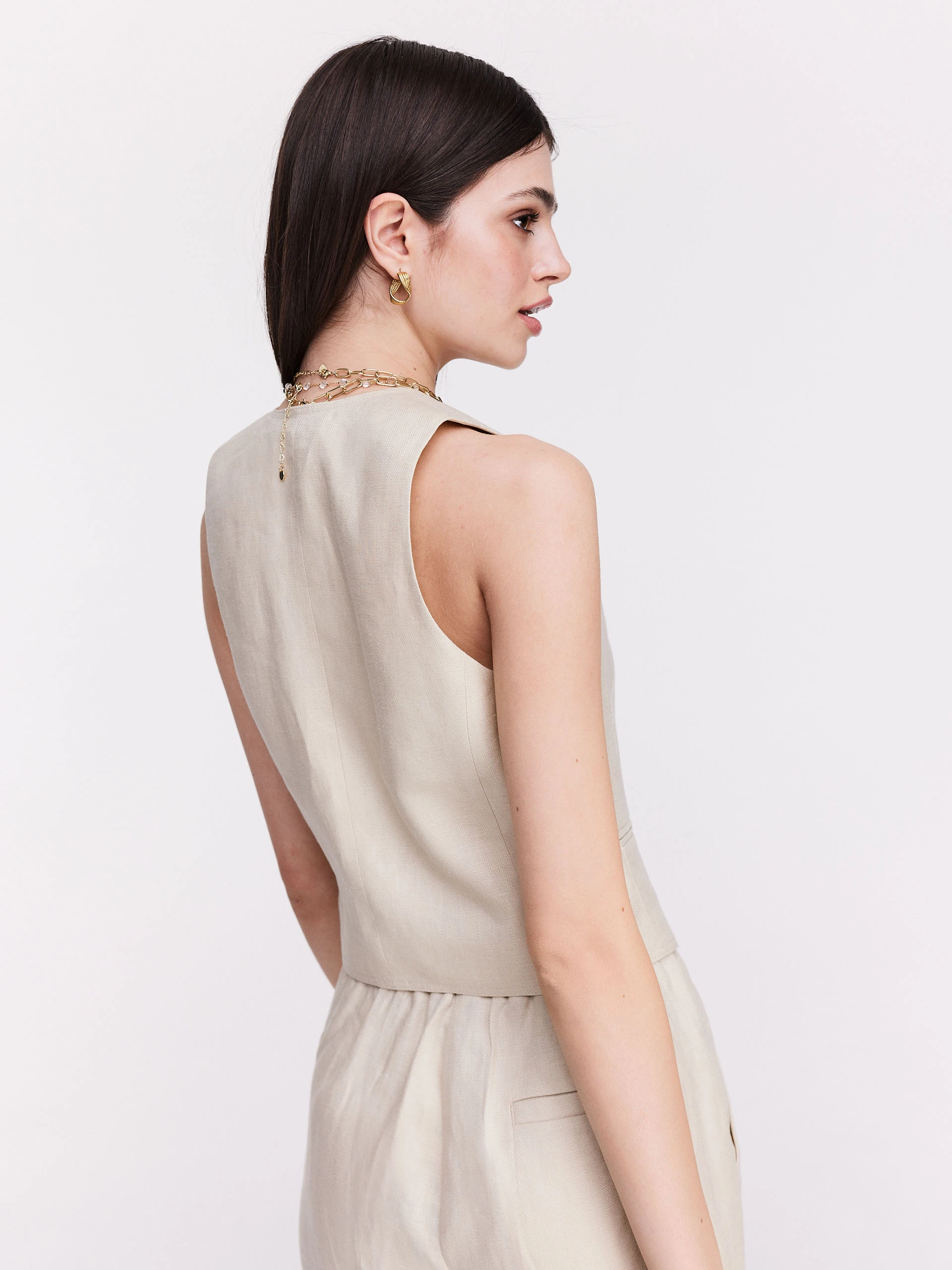 Elegancka beżowa kamizelka na guziki