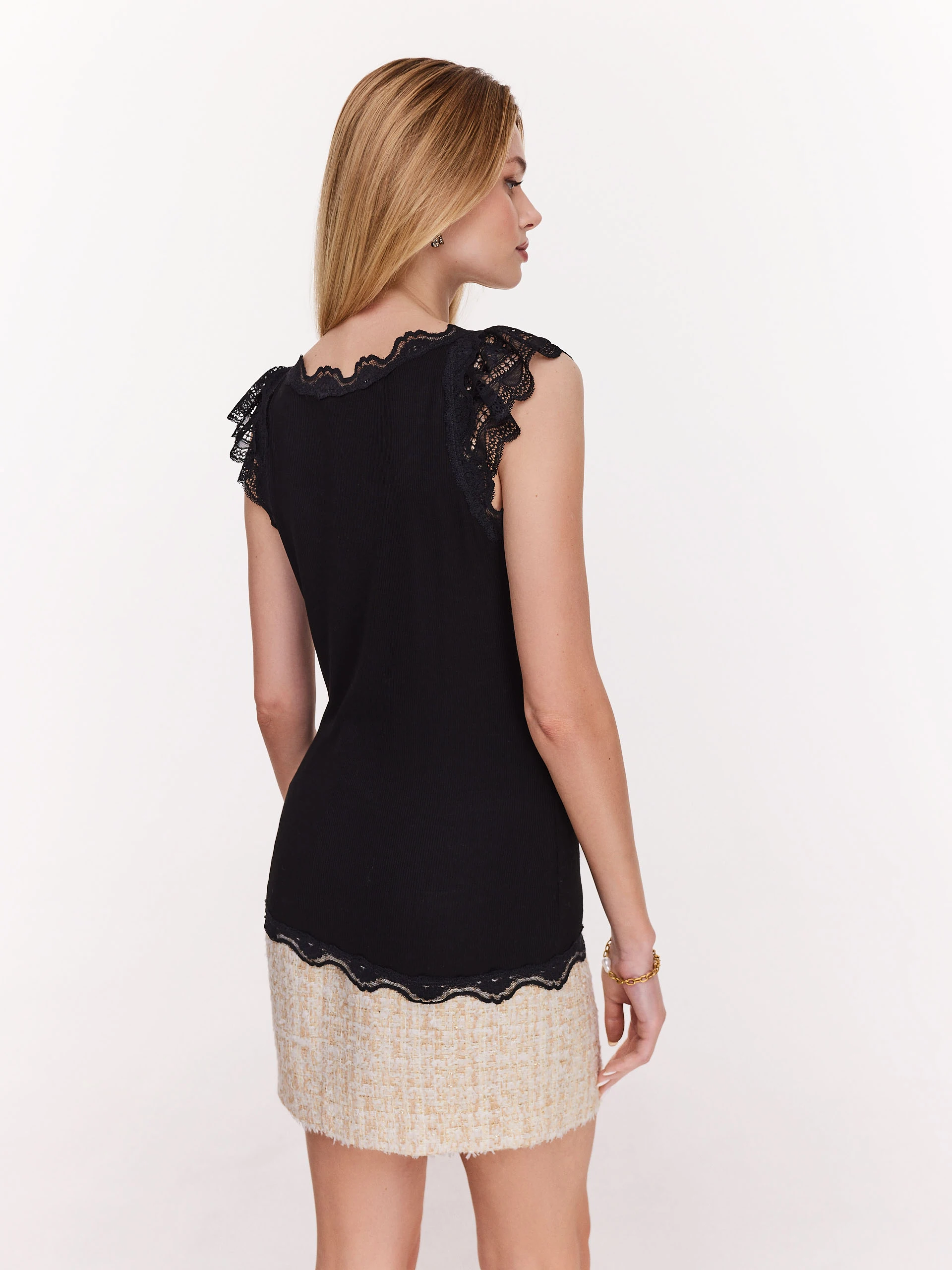Black blouse with short sleeves and lace inserts