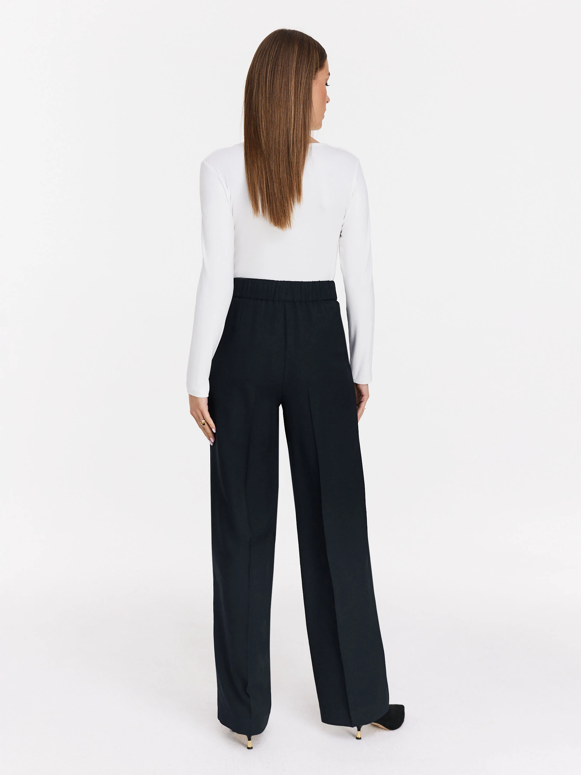 White blouse with striking cutouts