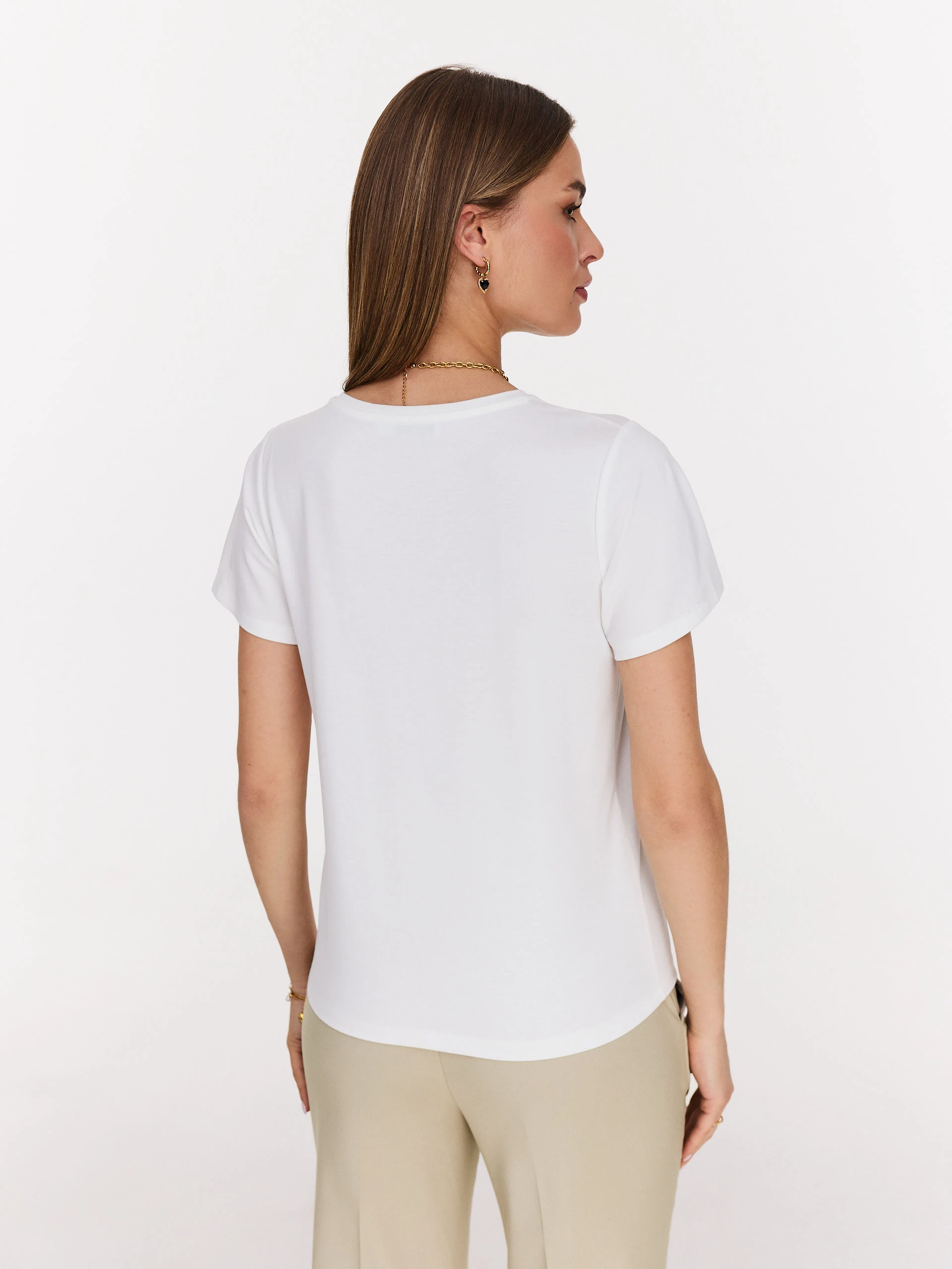 White blouse with patch embellishments
