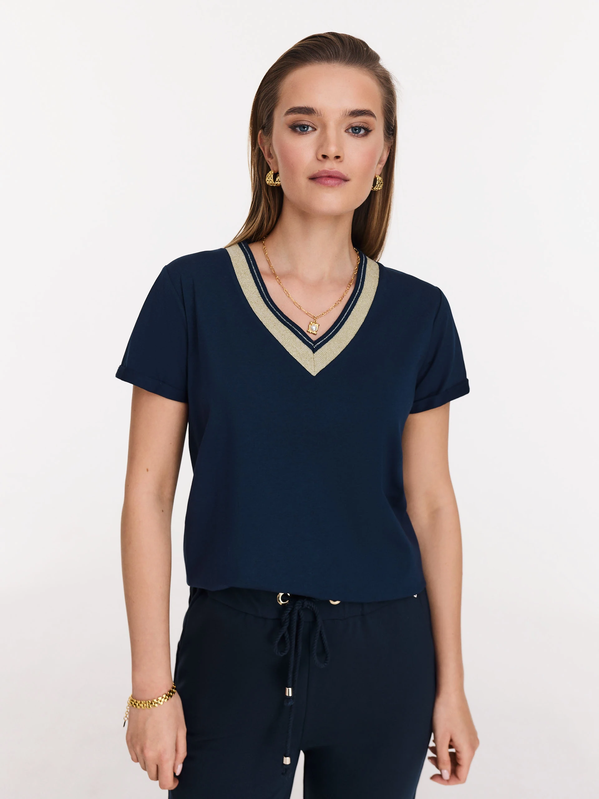 Navy blue blouse with piping and short sleeves