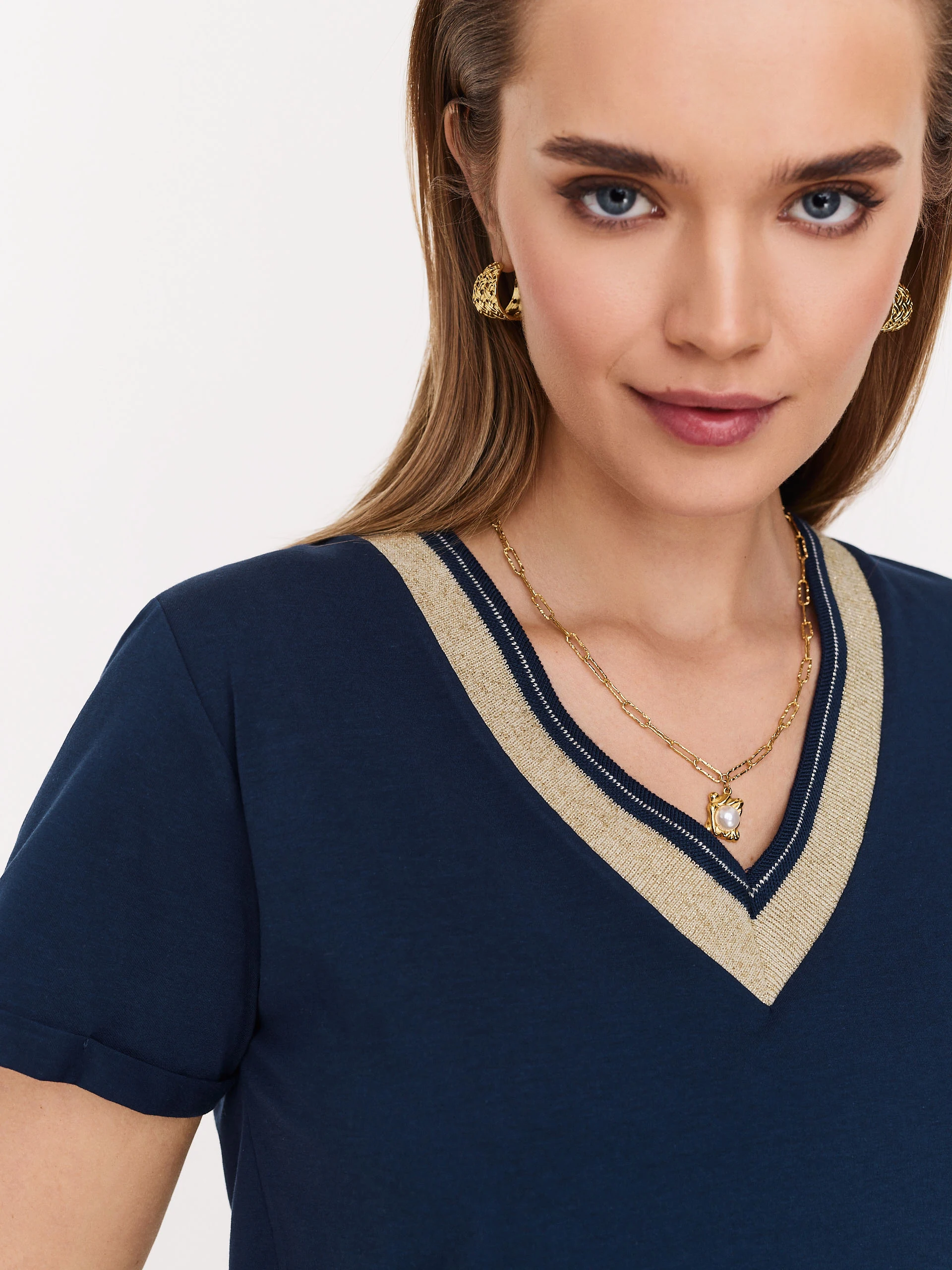 Navy blue blouse with piping and short sleeves