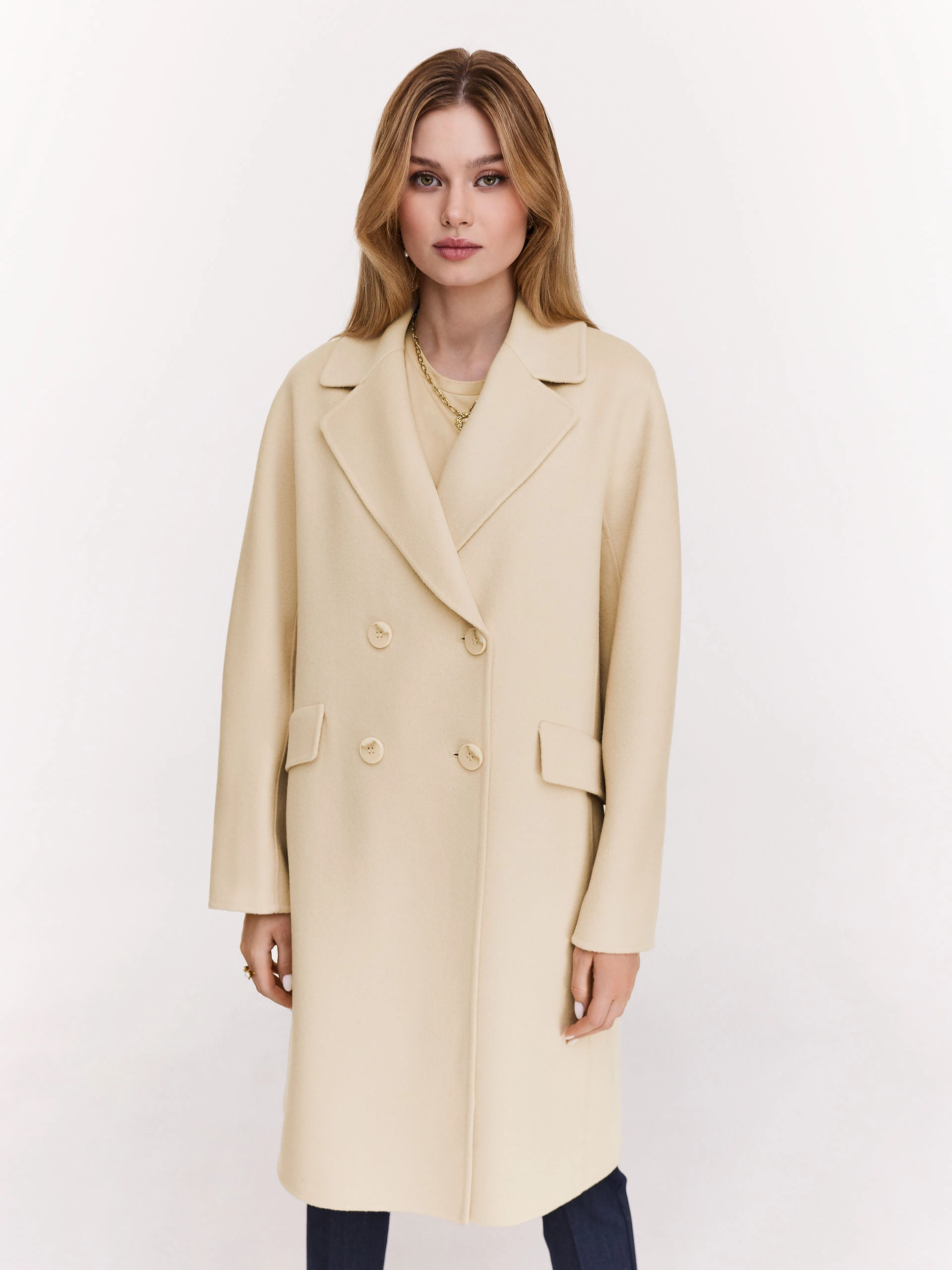 Wool cream coat with a classic cut