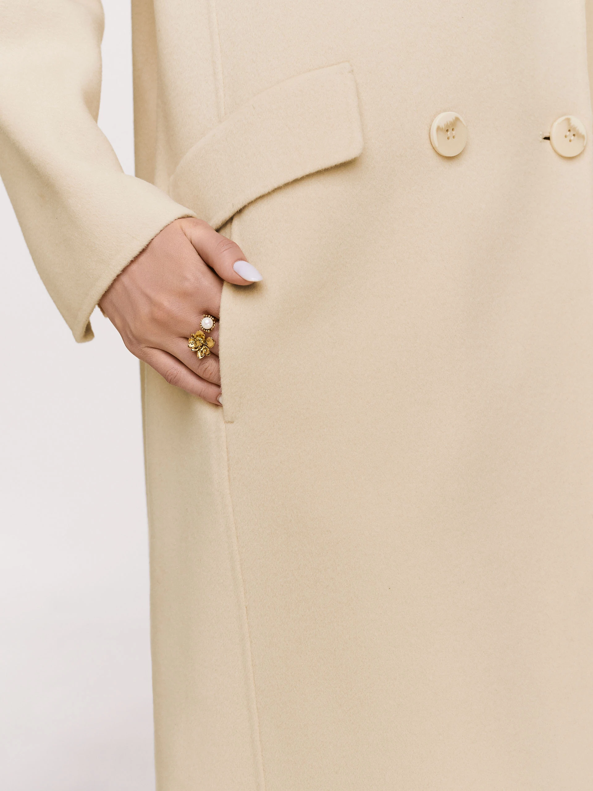 Wool cream coat with a classic cut