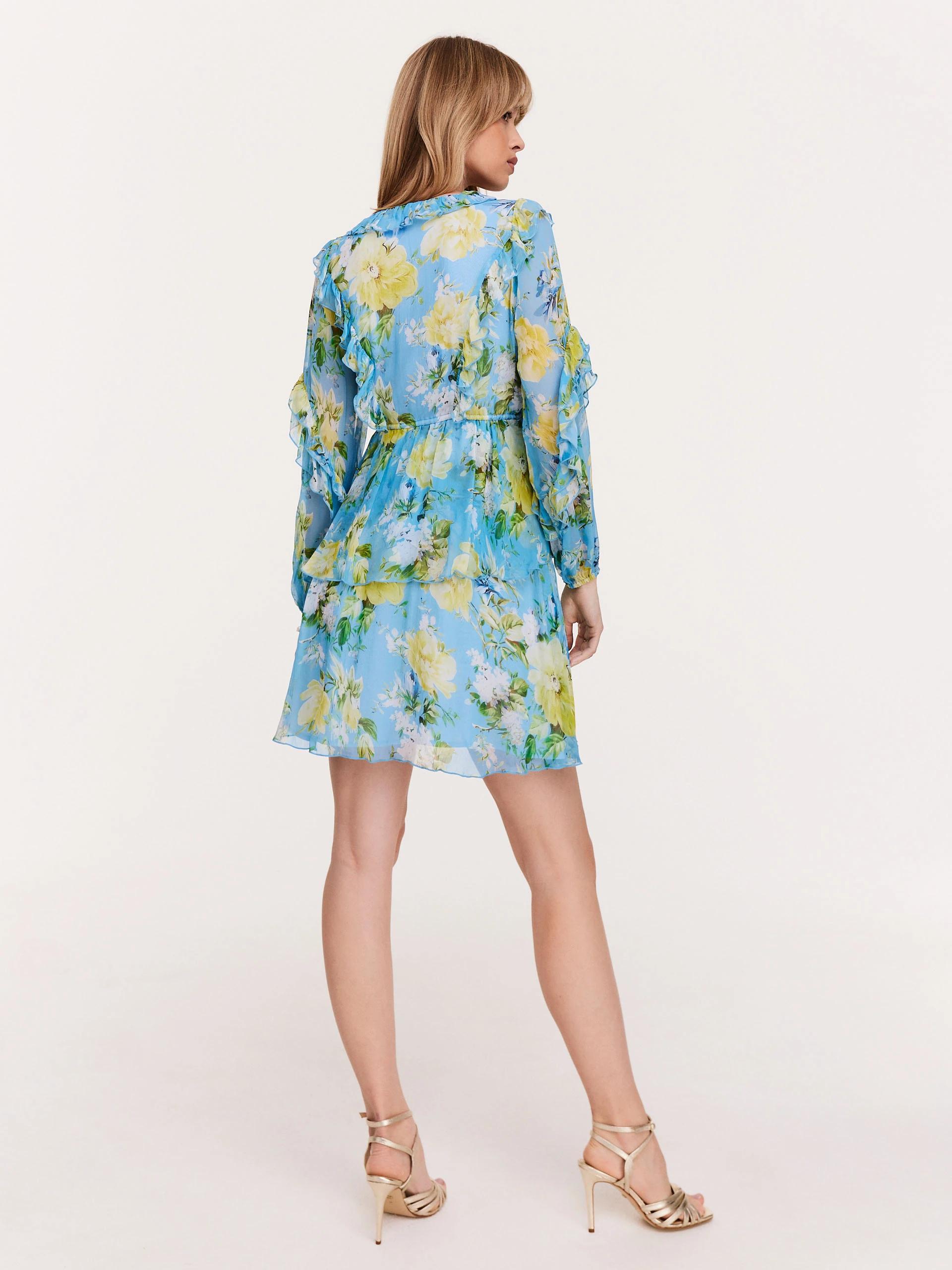 Blue dress with frills in yellow flowers