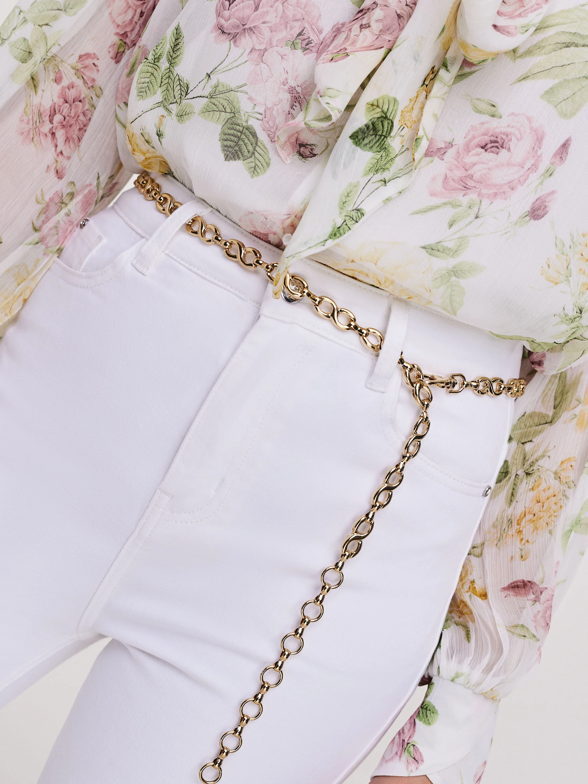 White cotton pants with flared legs