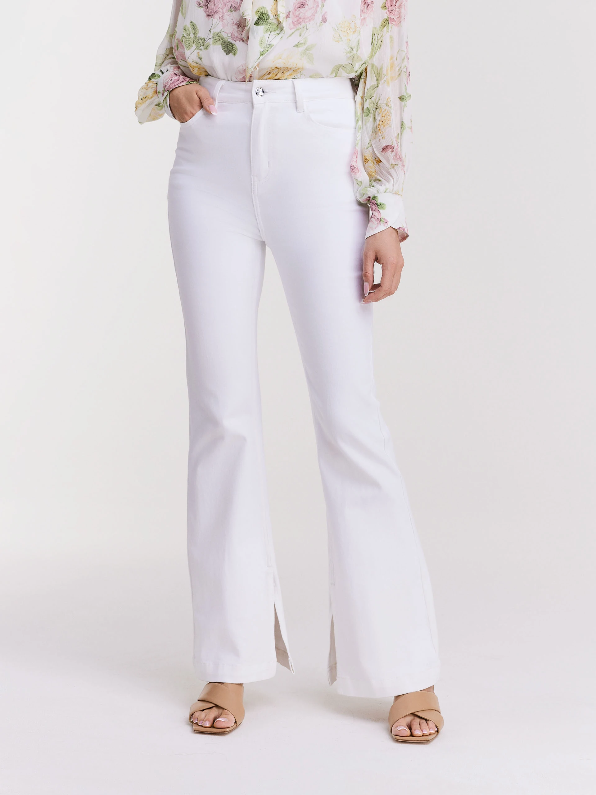 White cotton pants with flared legs