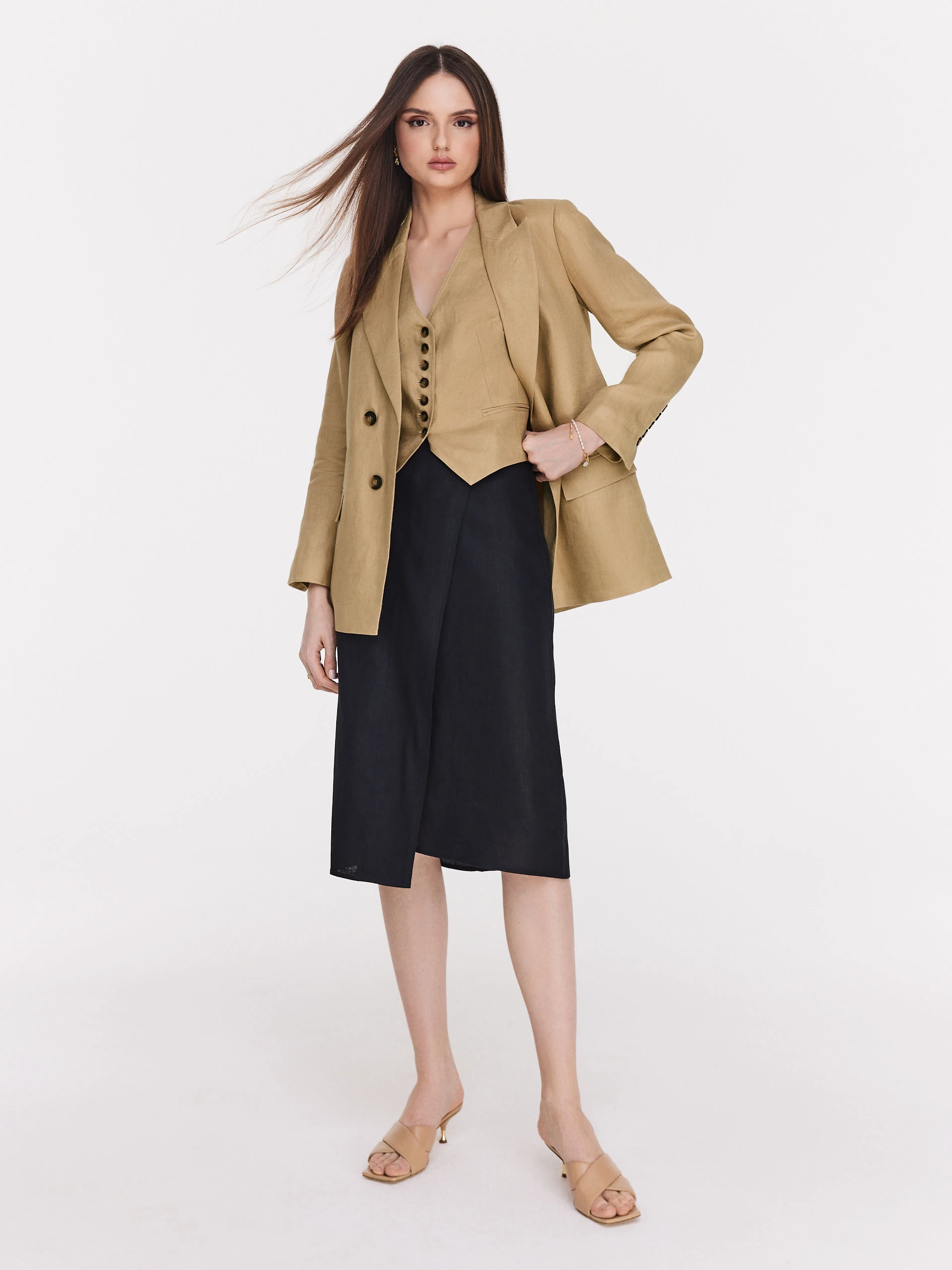 Black overlapping knee-length skirt