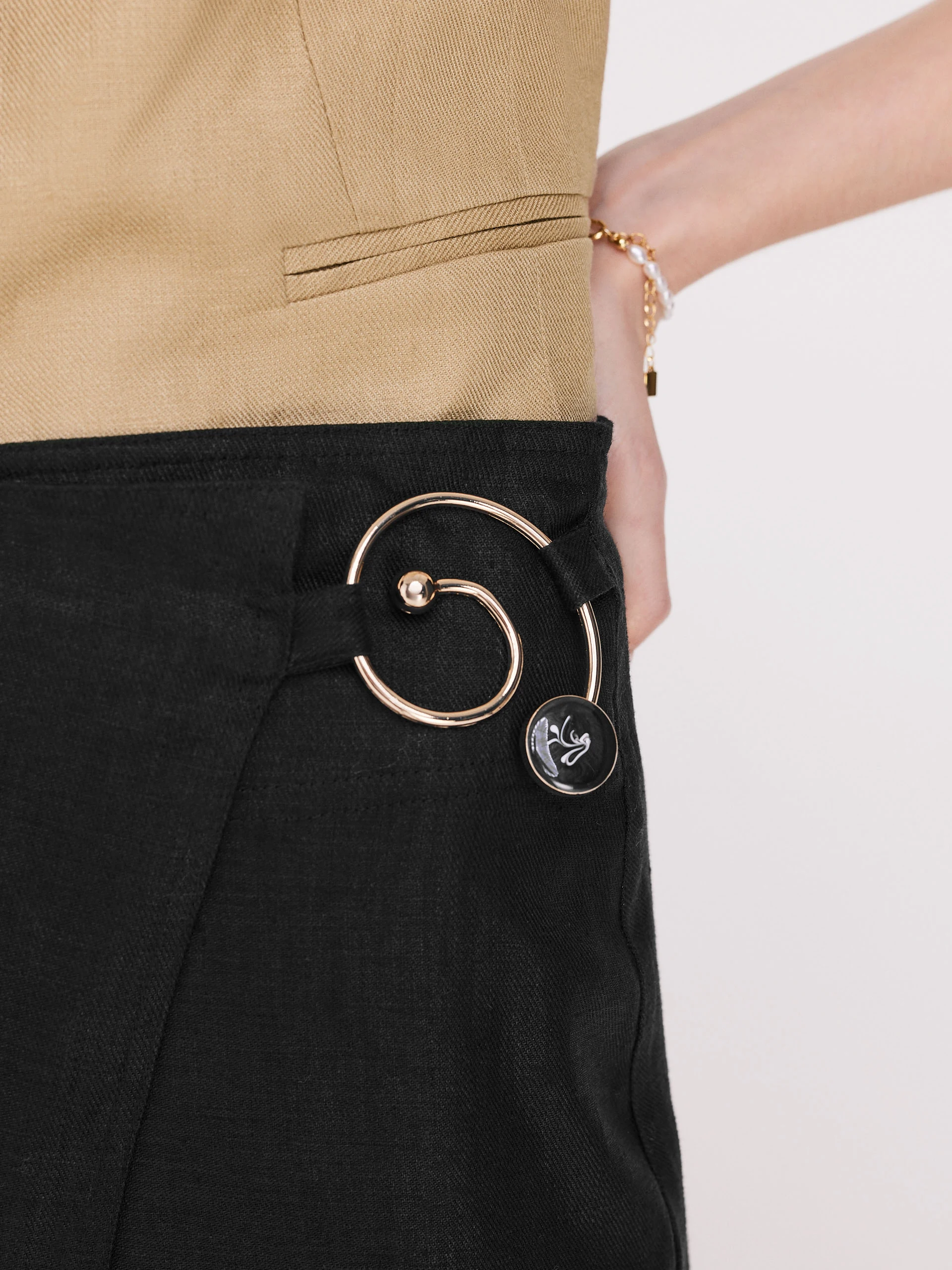 Black overlapping knee-length skirt