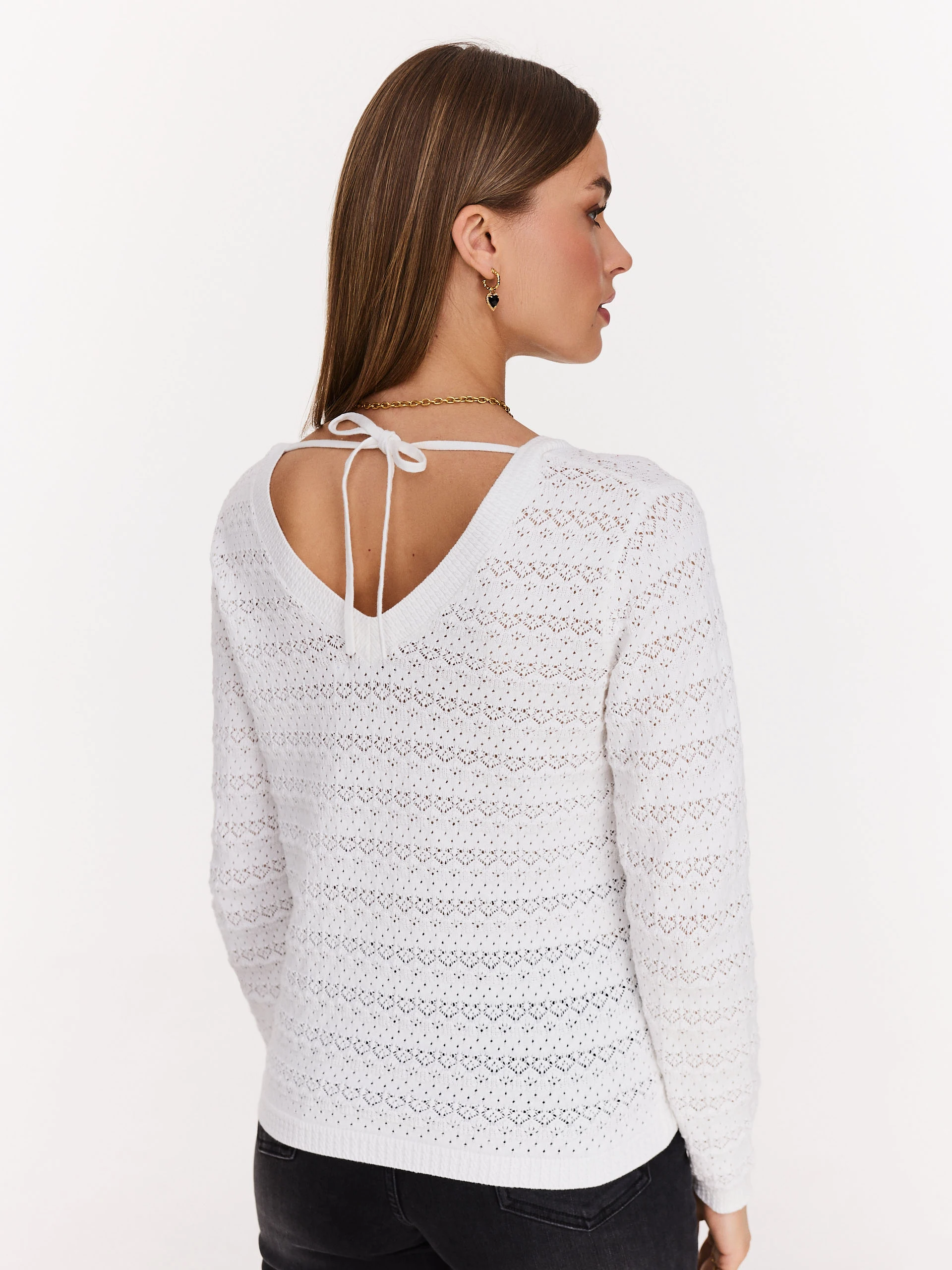 Openwork white sweater with V neckline