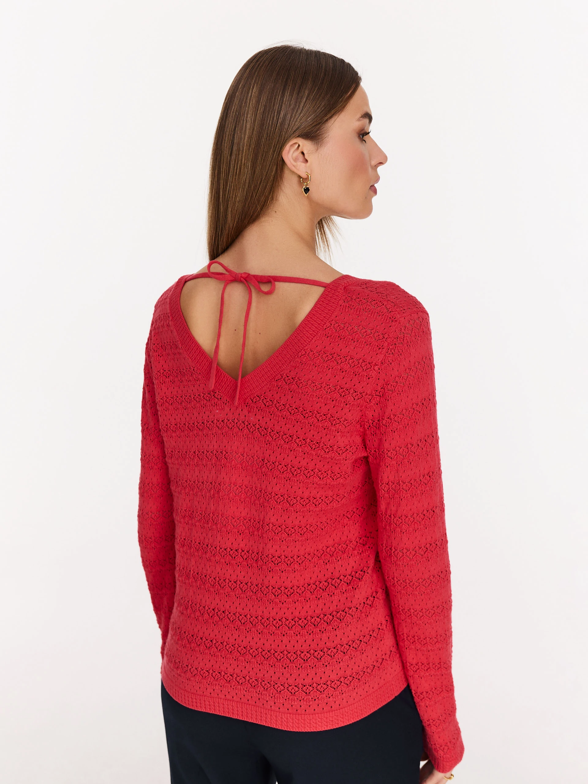 Red openwork sweater with V neckline