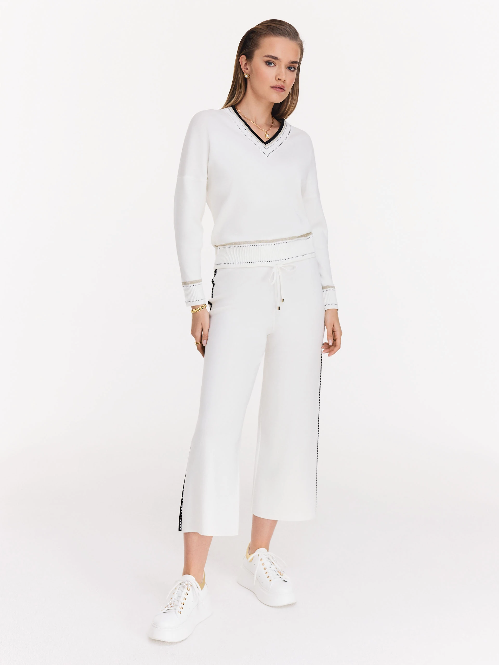 Cream sweater with V neckline
