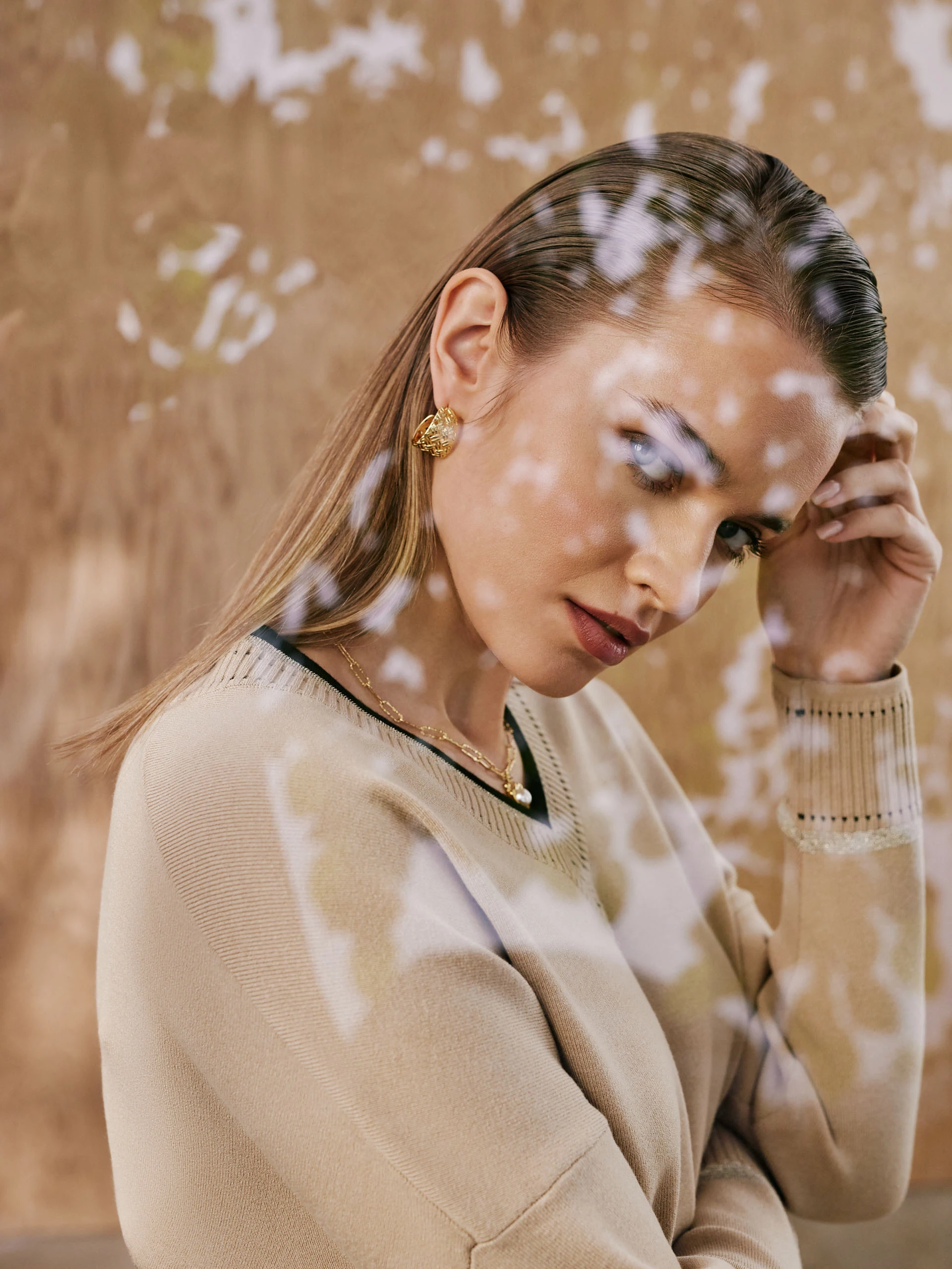 Beige sweater with V neckline