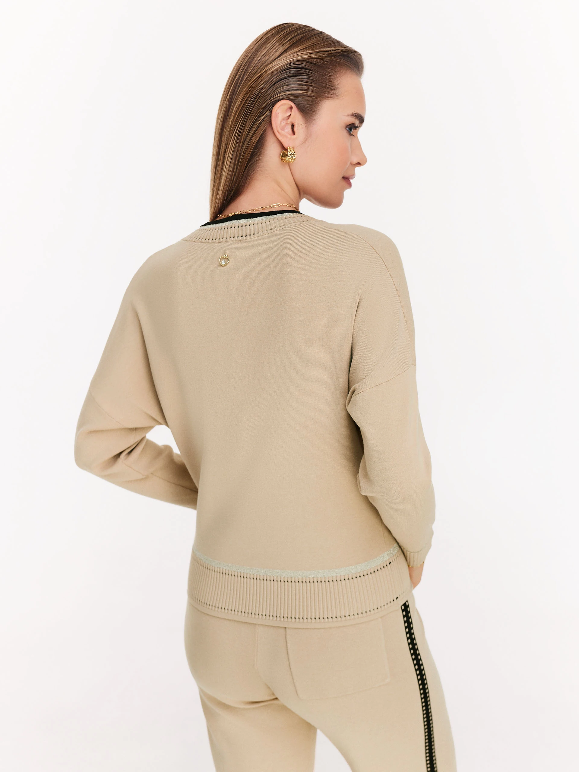 Beige sweater with V neckline
