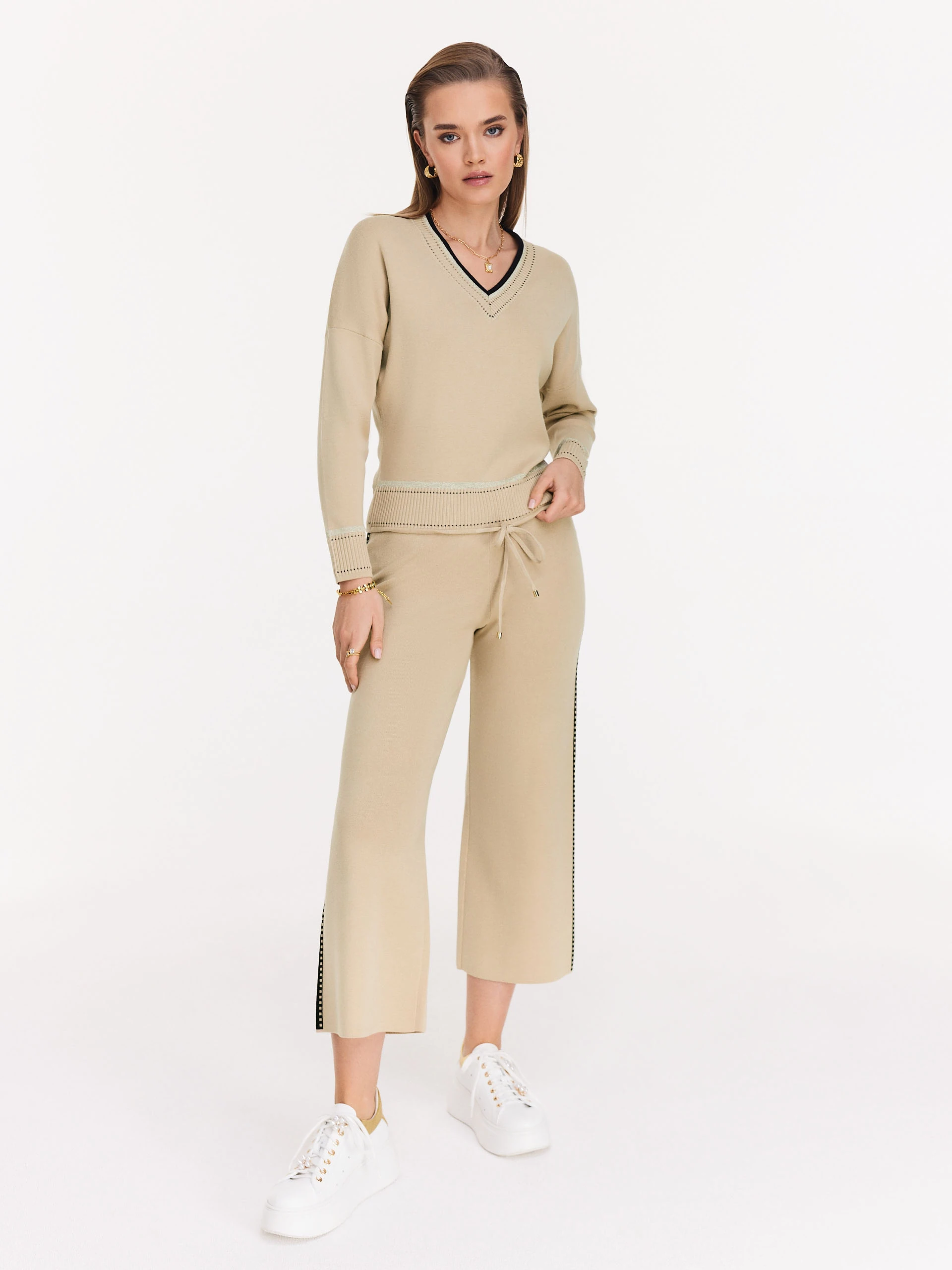 Beige sweater with V neckline