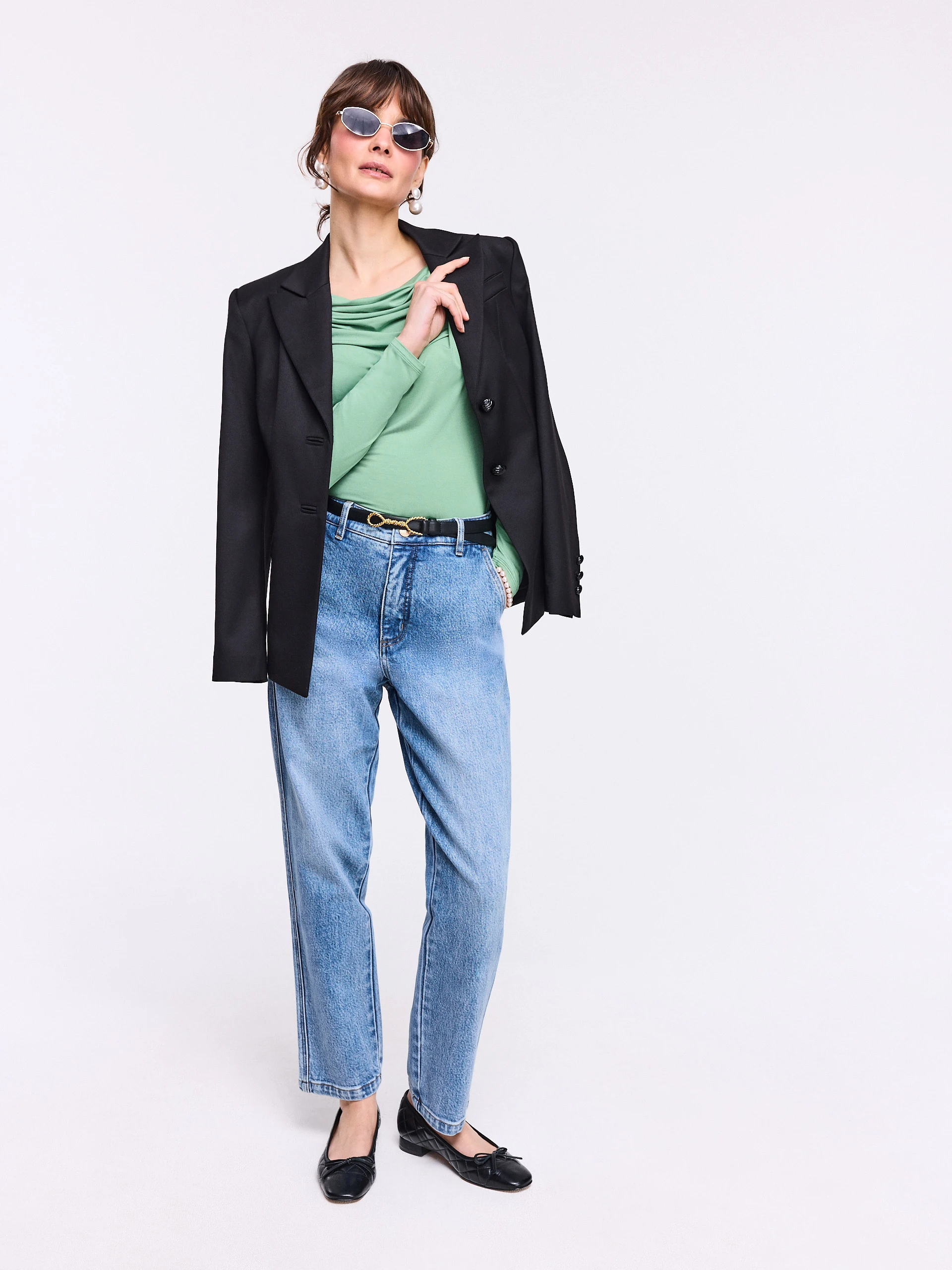 Light green blouse with ruffles and long sleeves