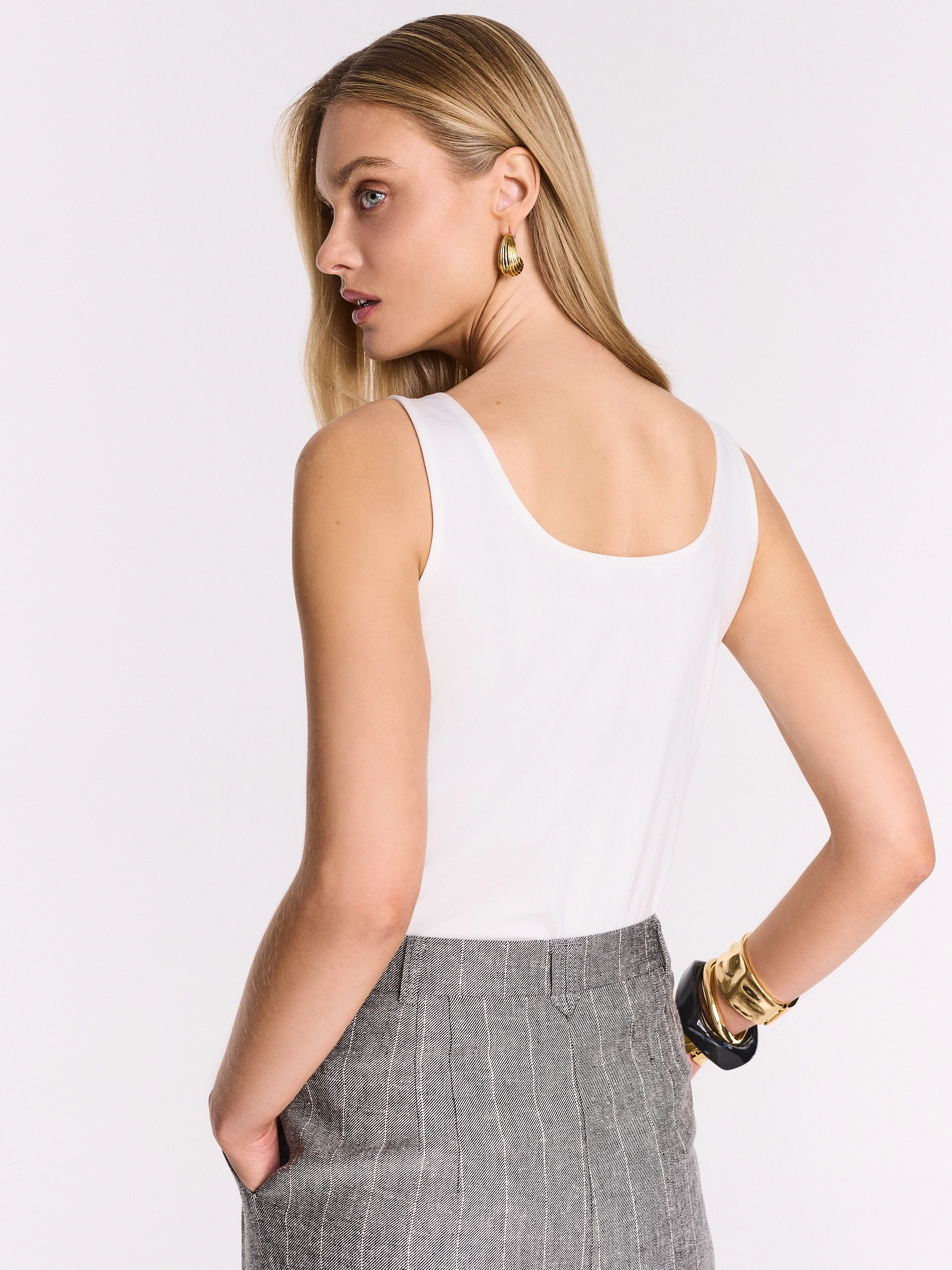 White sleeveless blouse