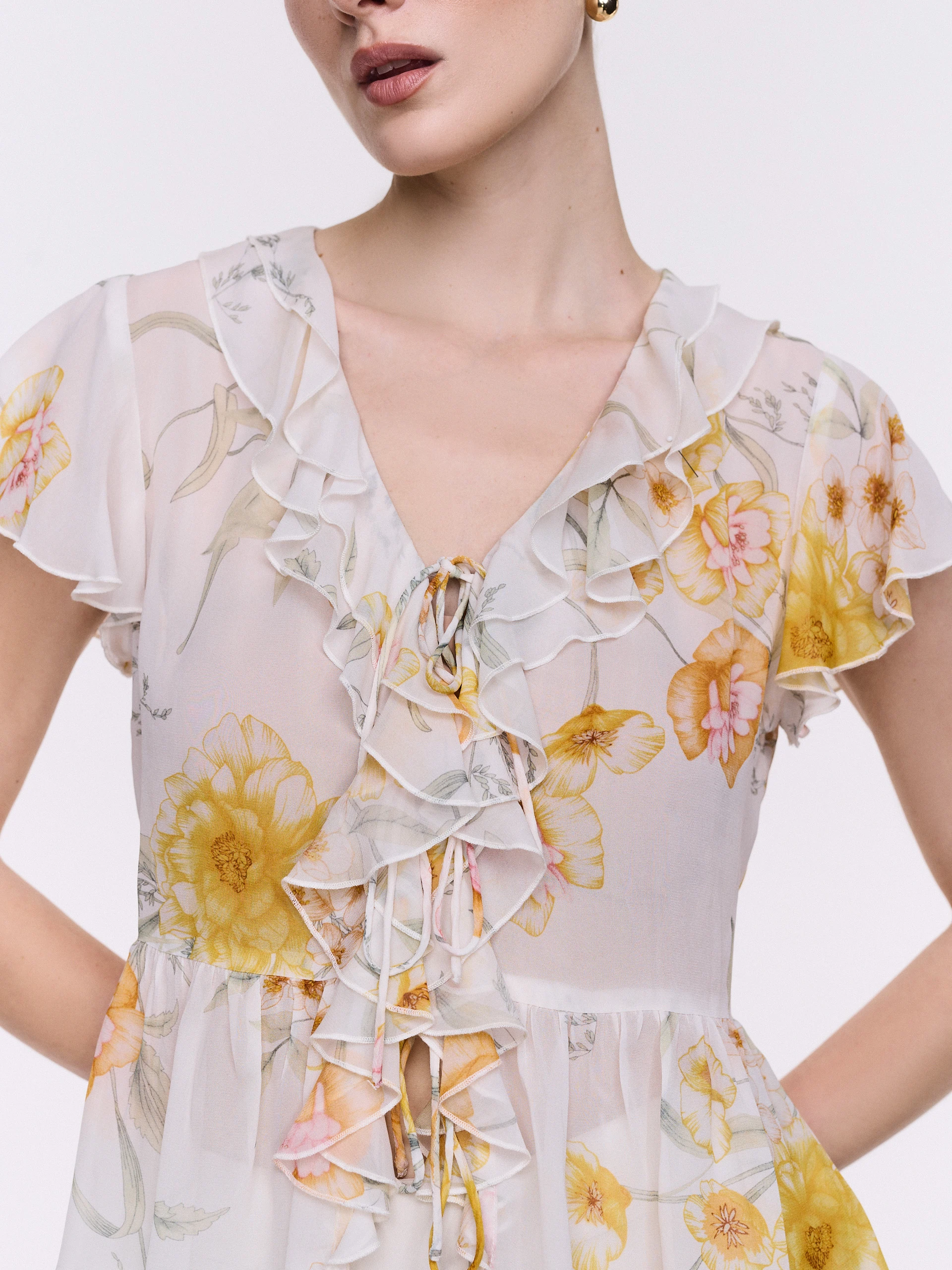 Cream-colored floral blouse