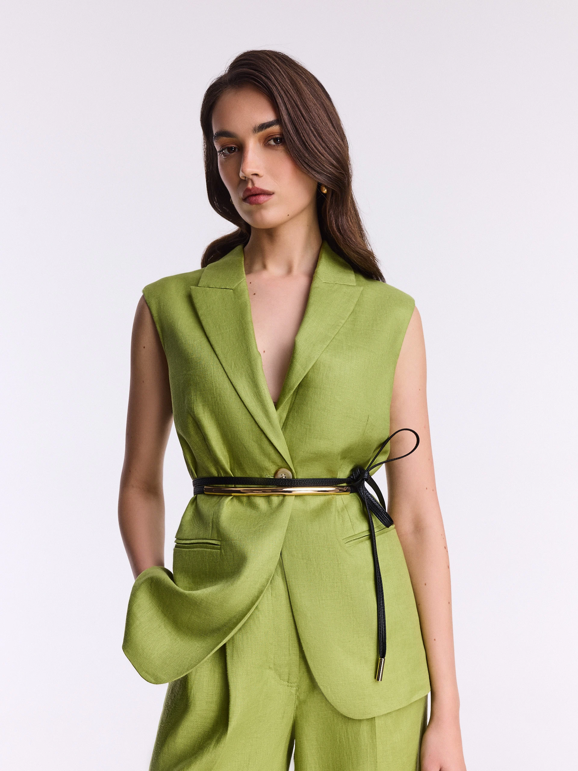An elegant linen vest in light green