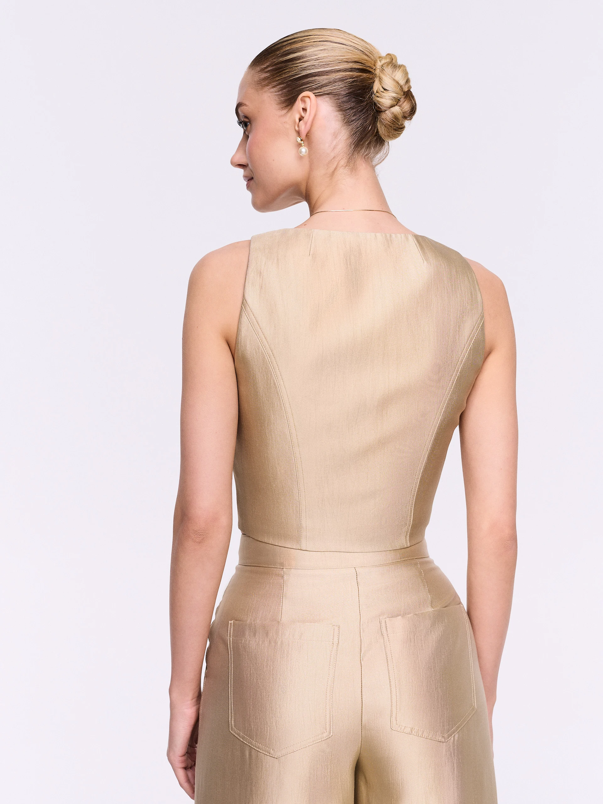A vest in a golden shade