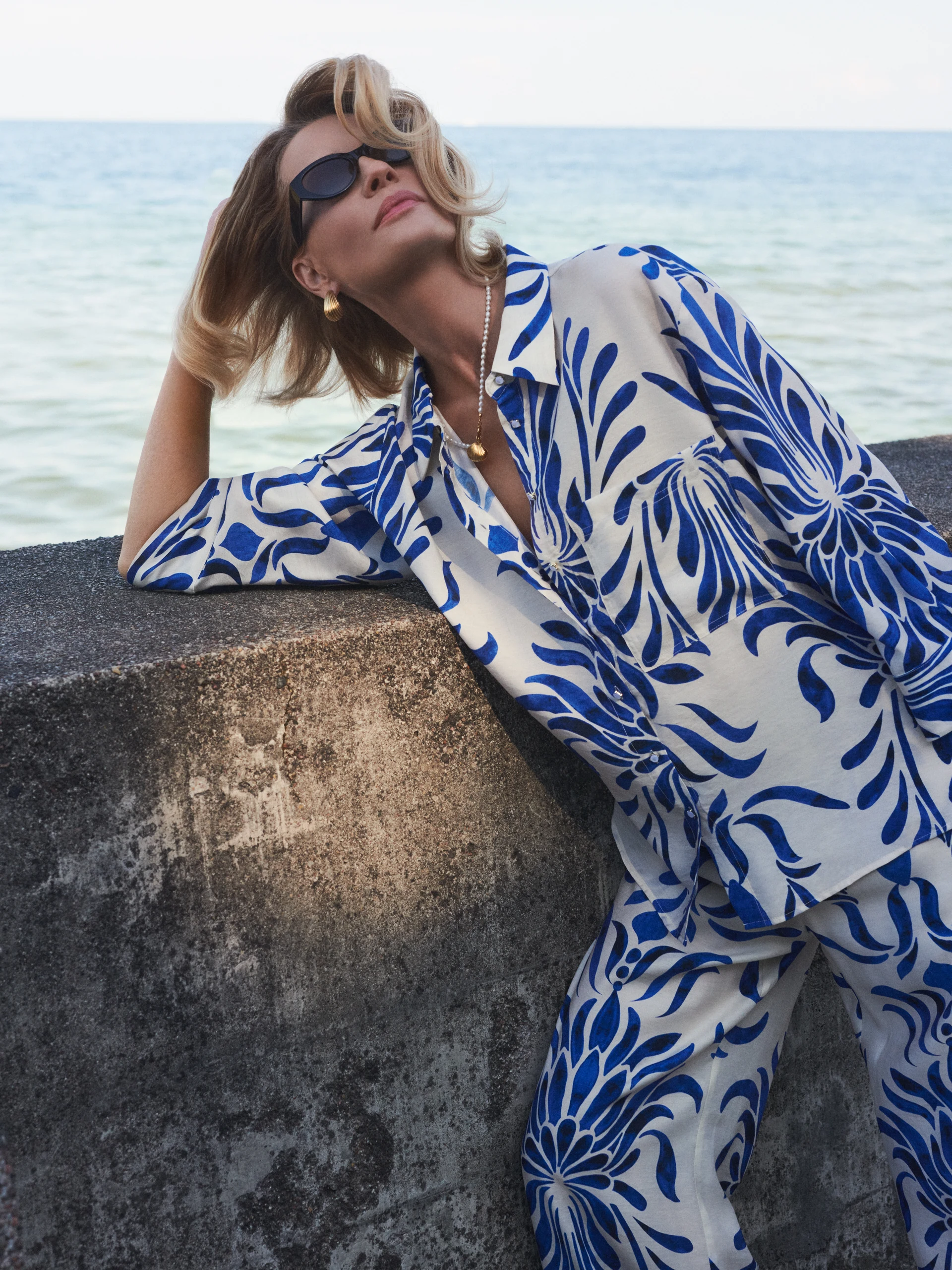 White oversized shirt with an ornamental pattern