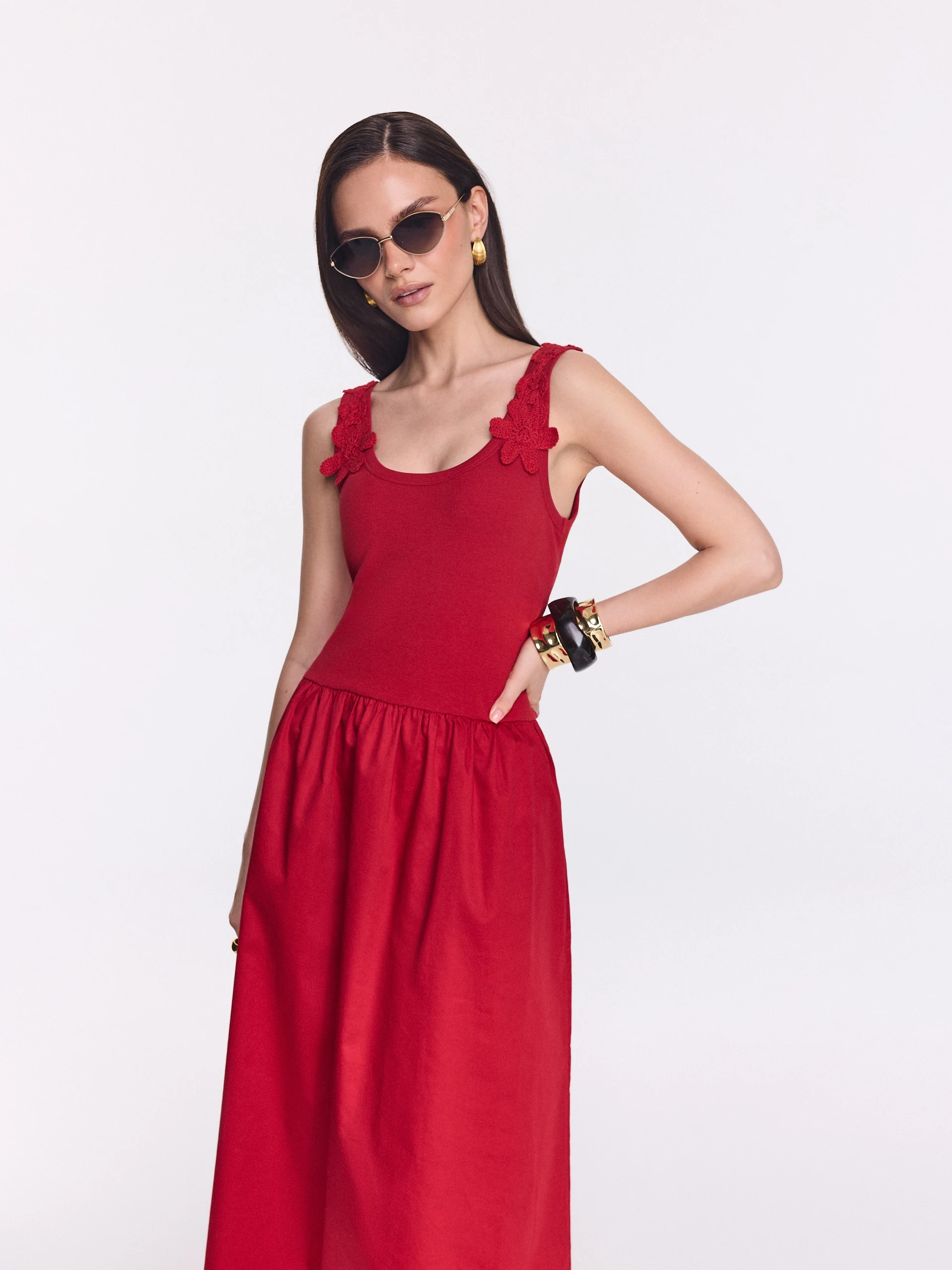 Red midi dress with decorative straps