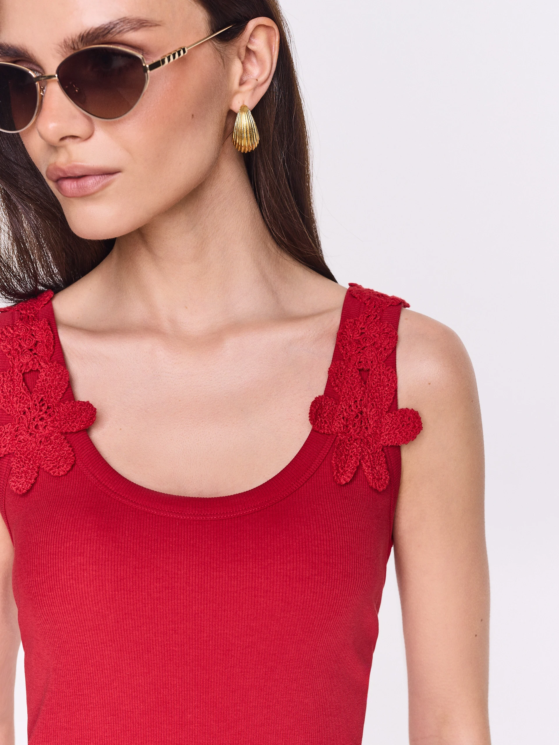 Red midi dress with decorative straps