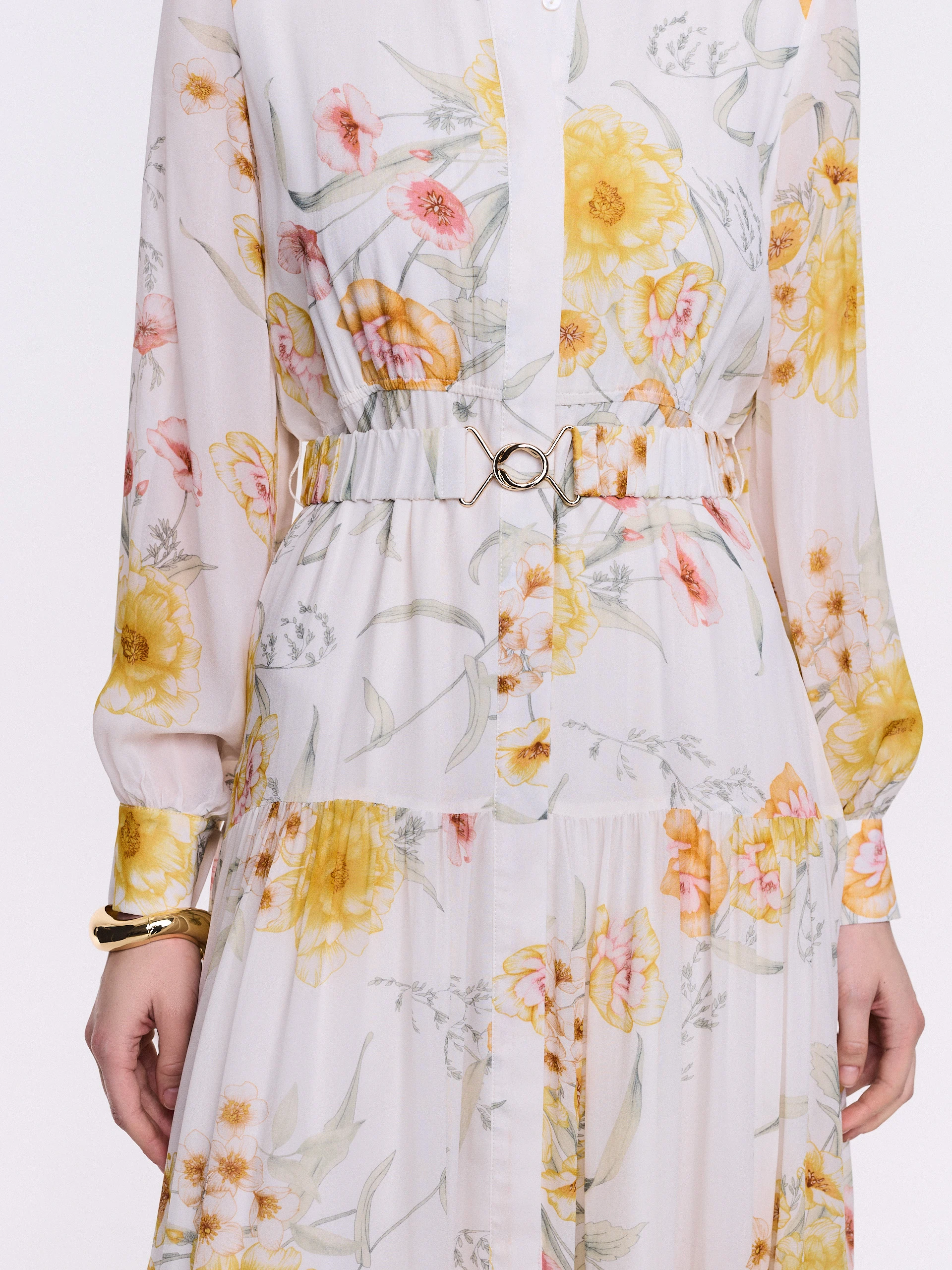A shirt dress with yellow flowers