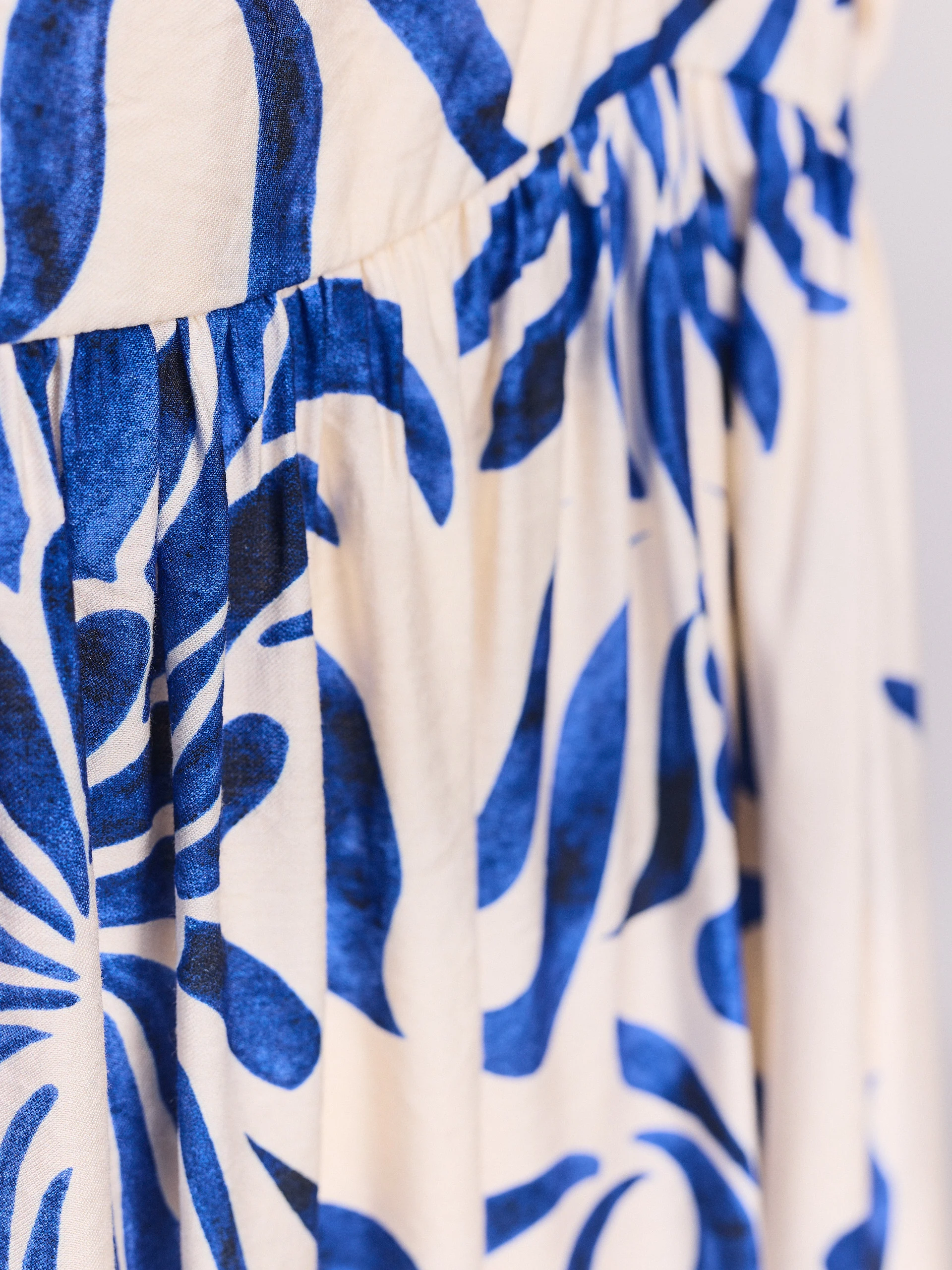 White maxi dress with an ornamental pattern