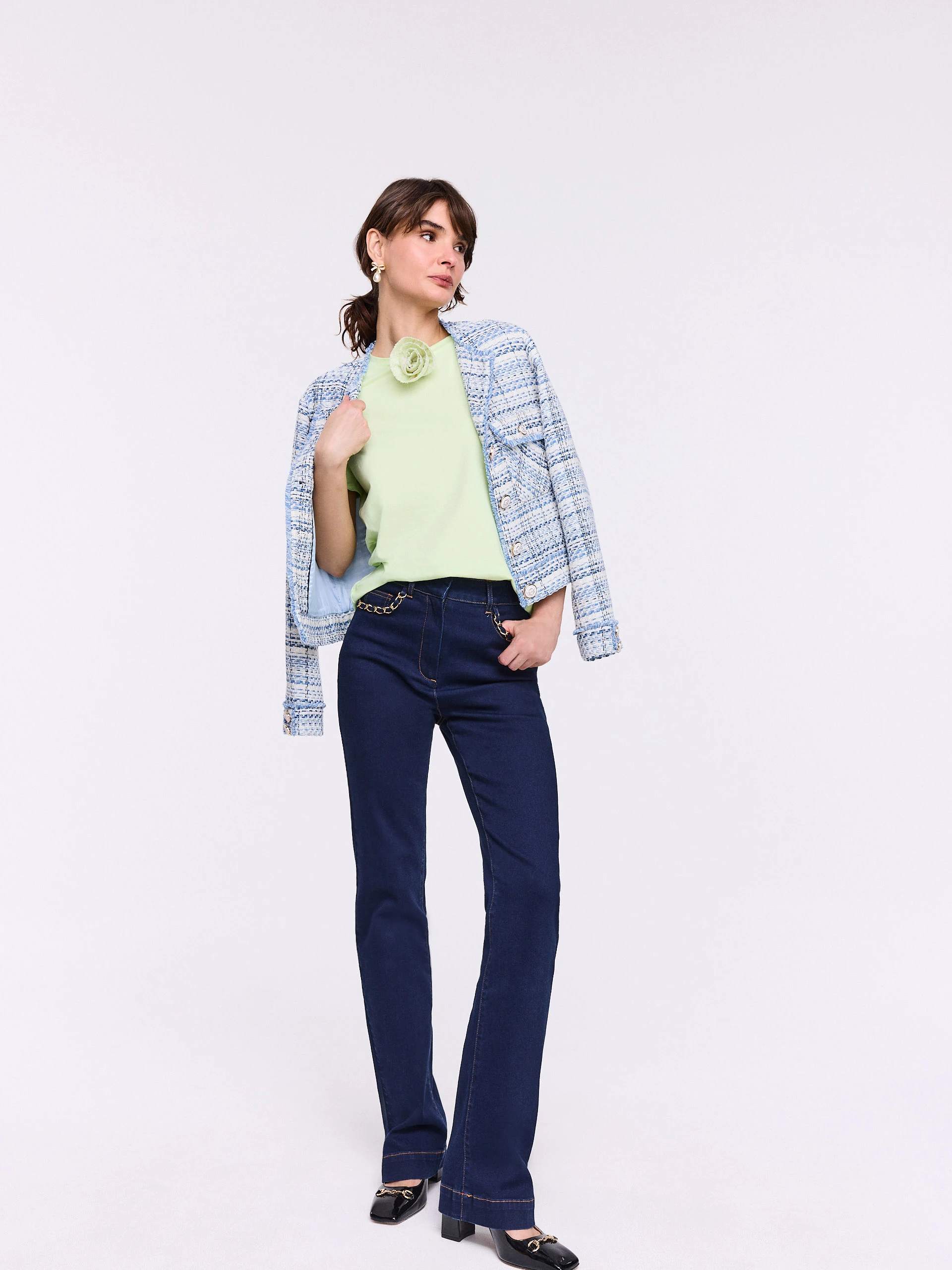 Navy blue straight jeans with decorative pockets