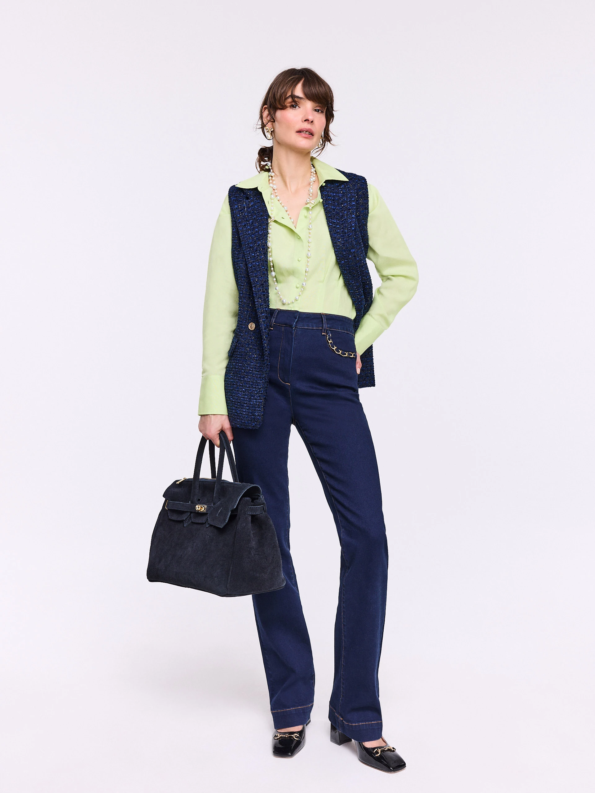Navy blue straight jeans with decorative pockets
