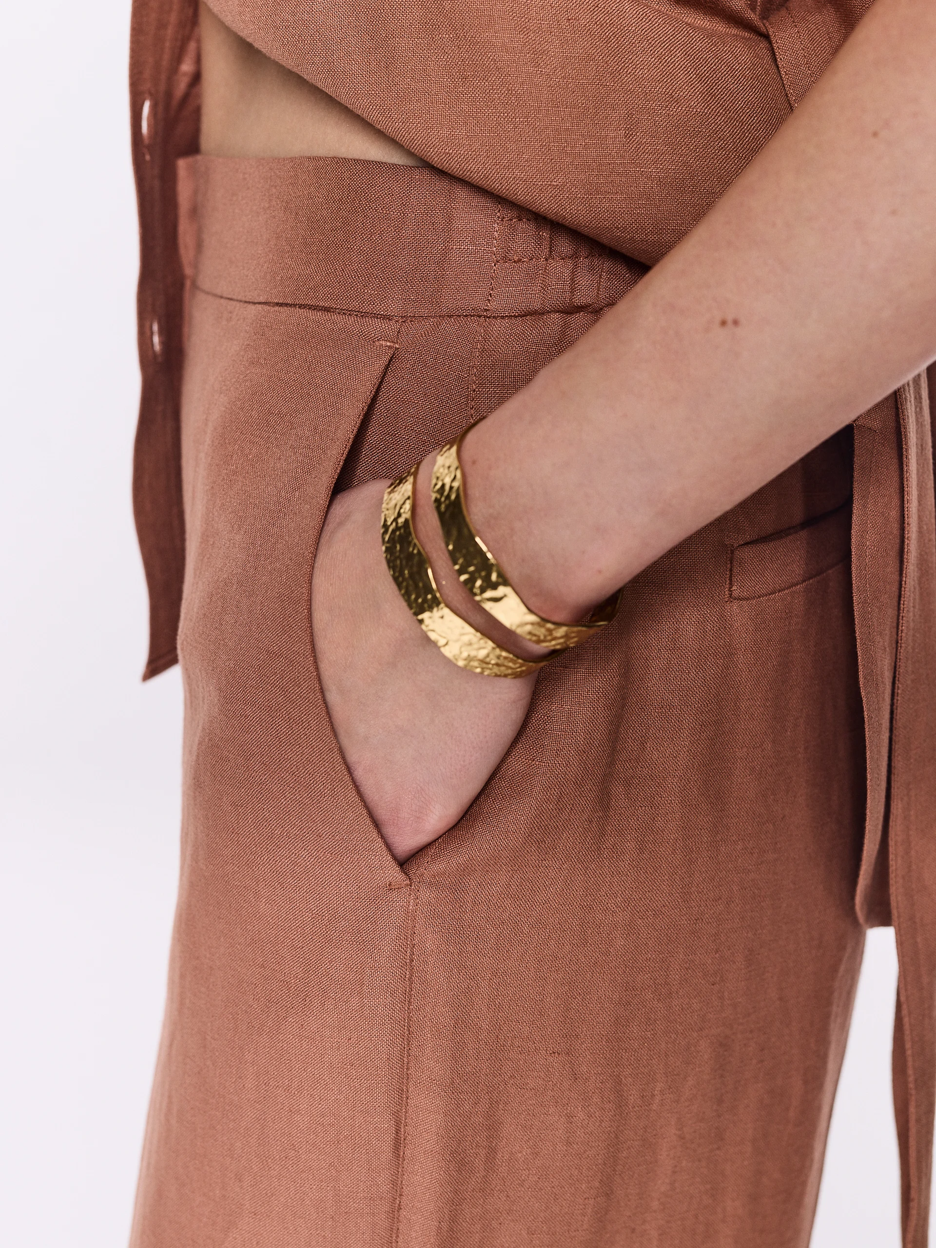 Caramel-colored wide-leg pants with linen