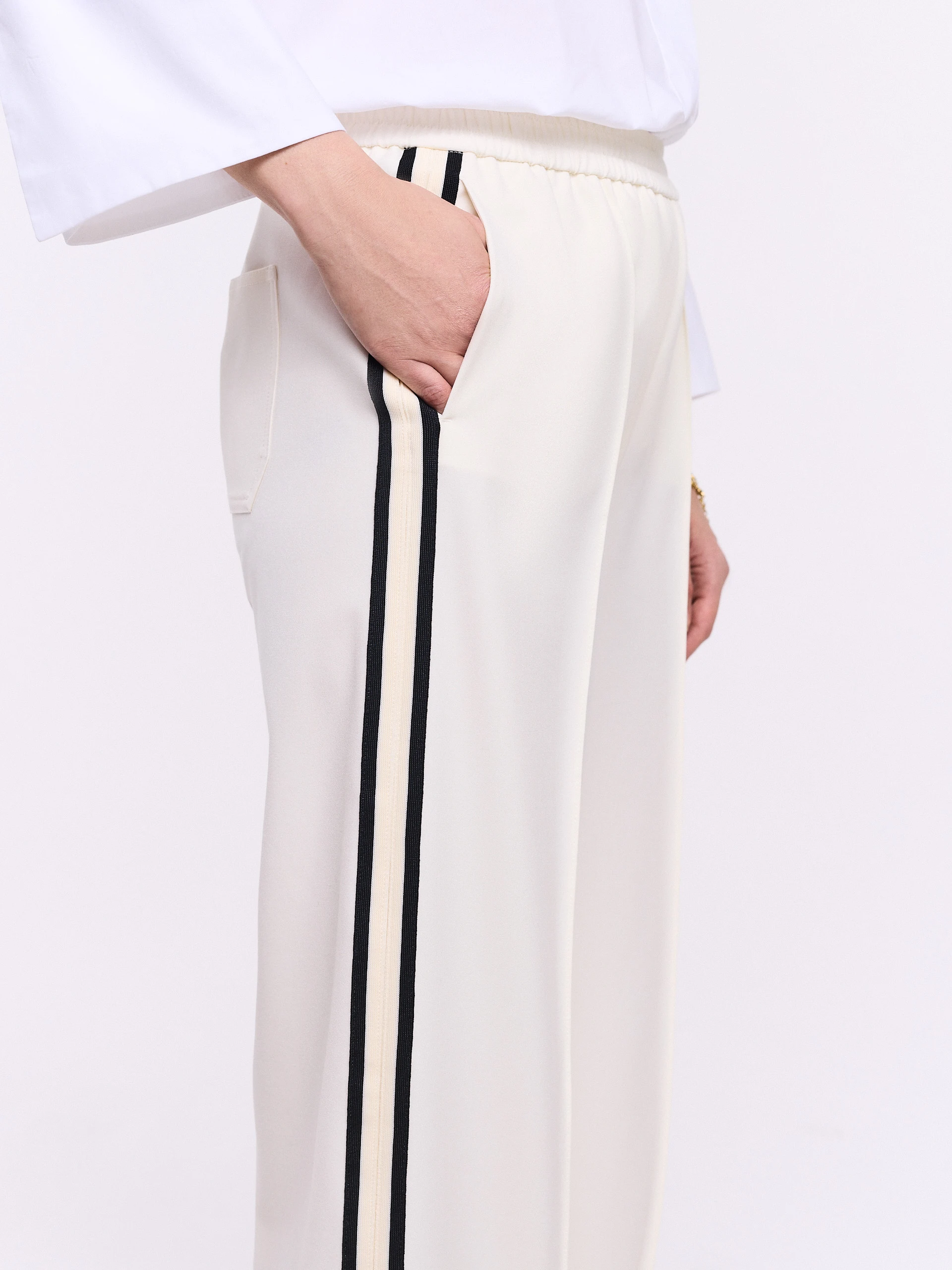 Cream pants with black piping