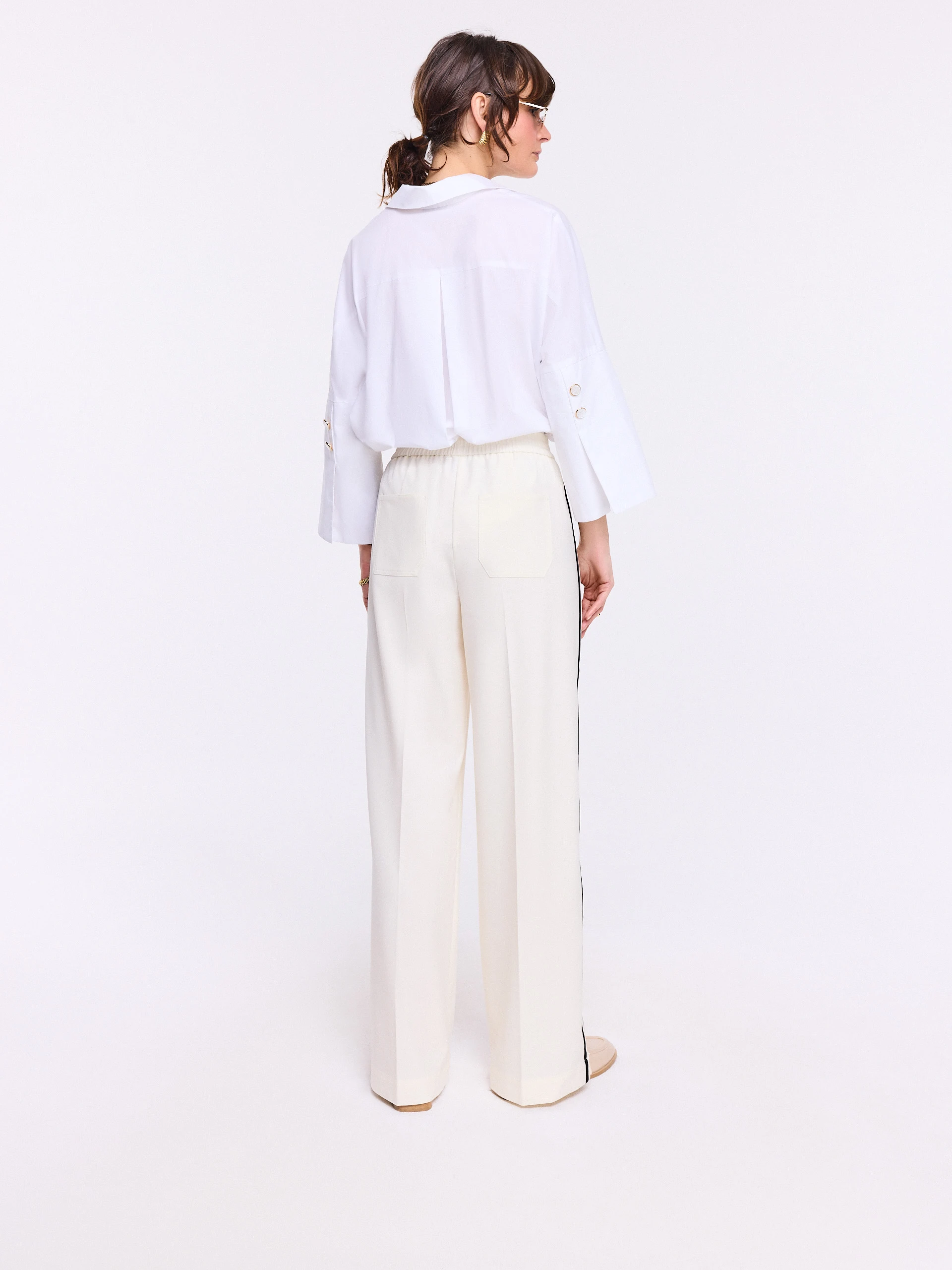 Cream pants with black piping