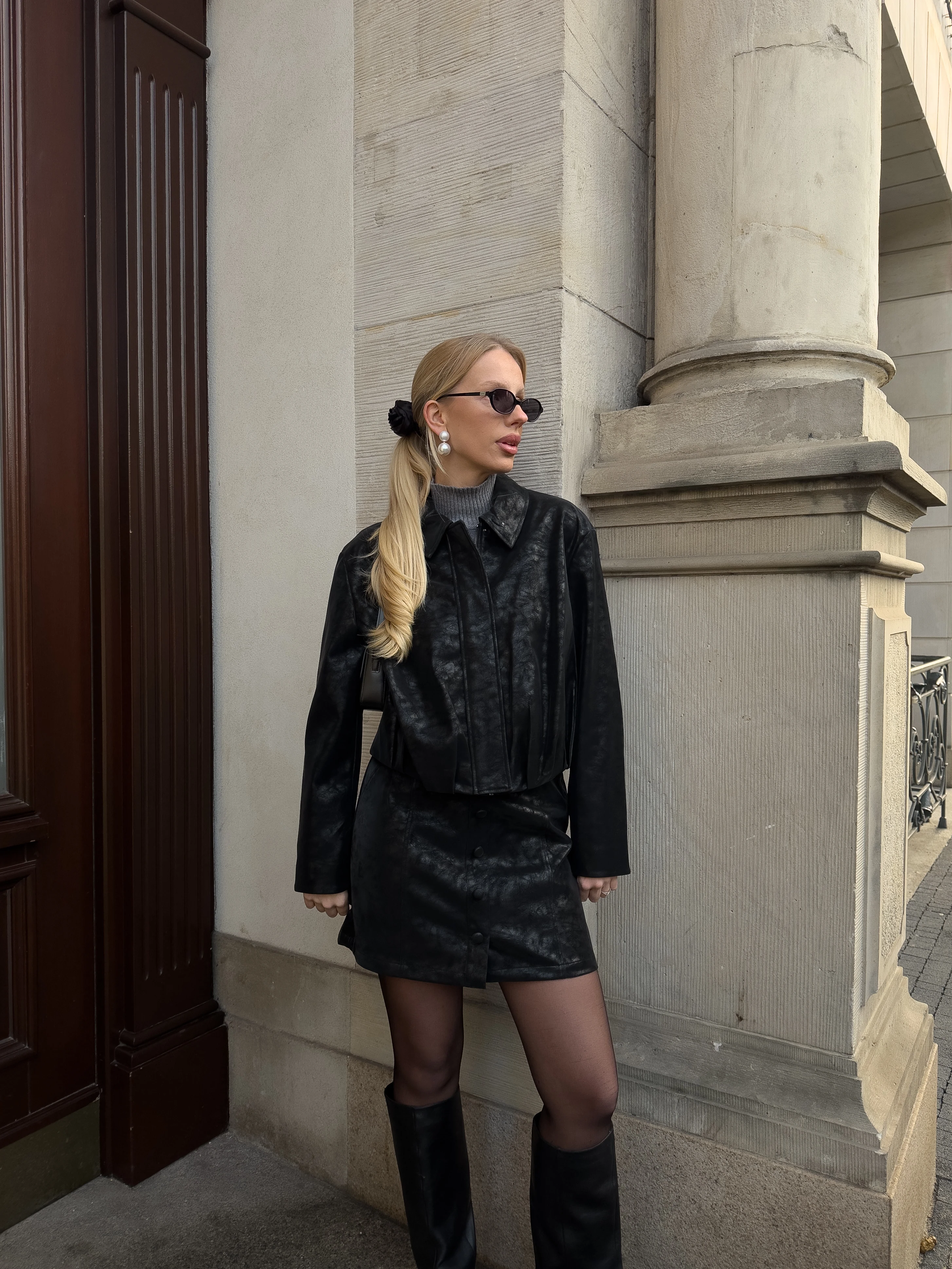 Short black faux leather skirt