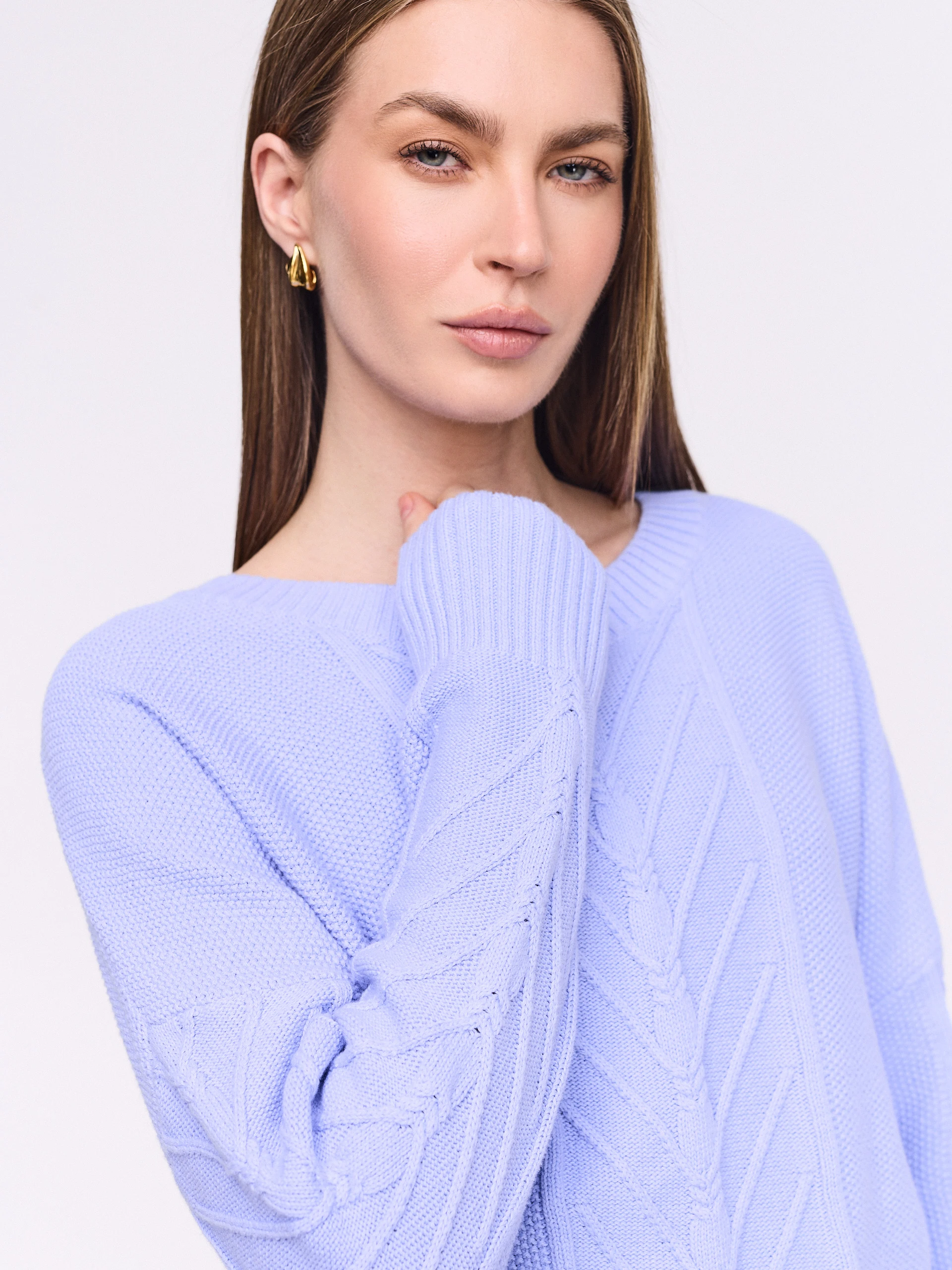 Purple cotton sweater with cable knit pattern