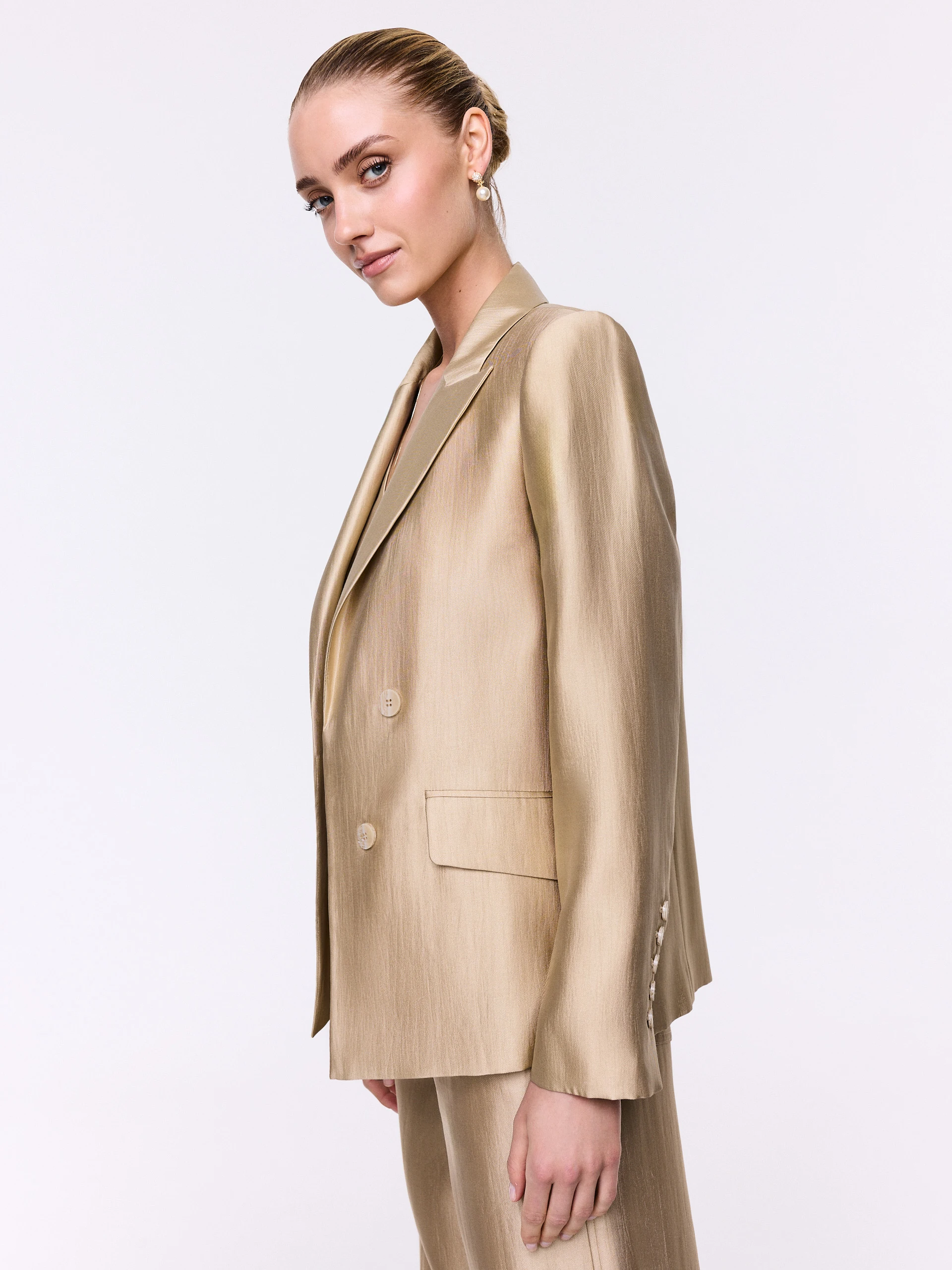 A gold-toned blazer