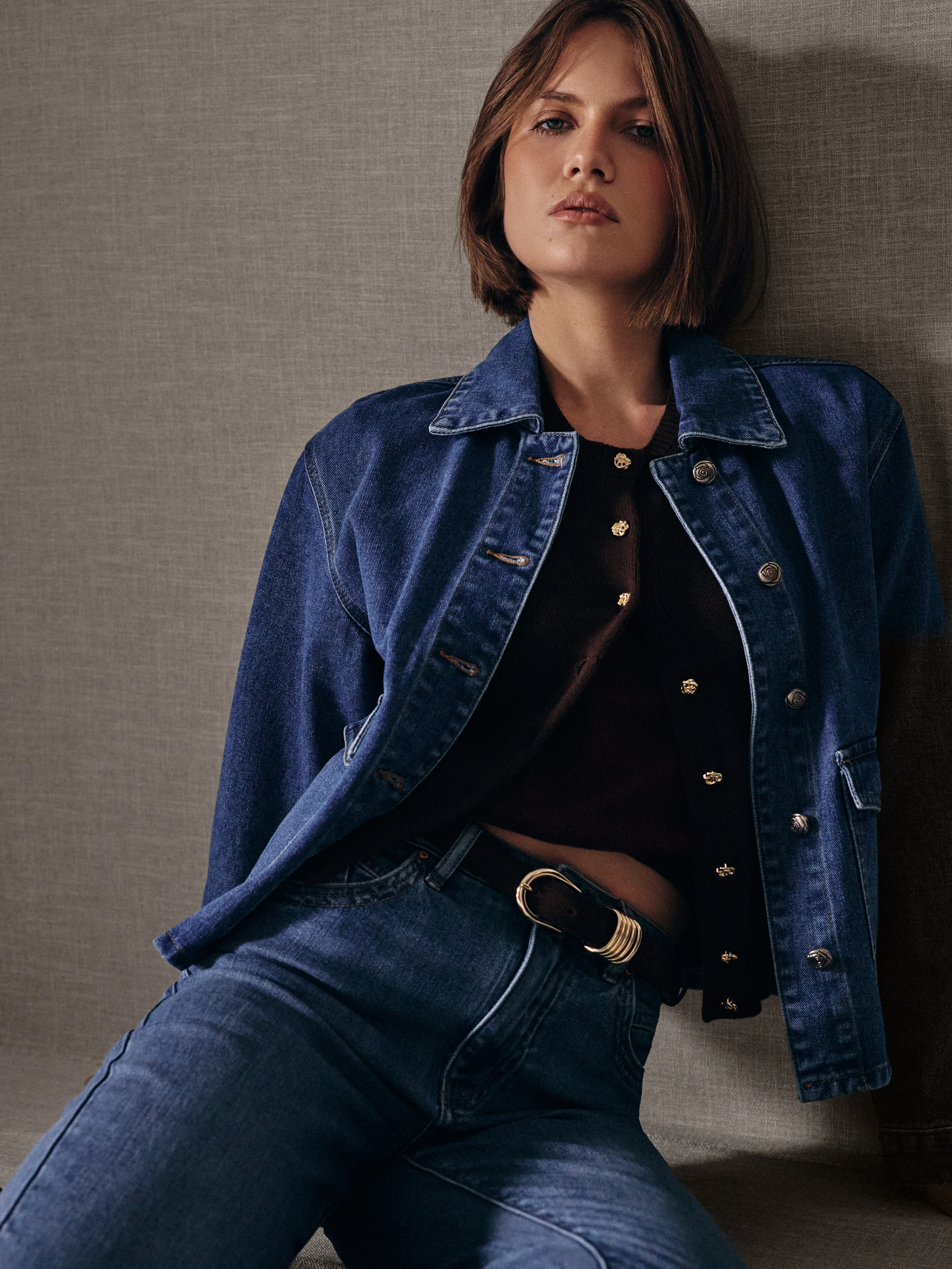Denim jacket with decorative buttons