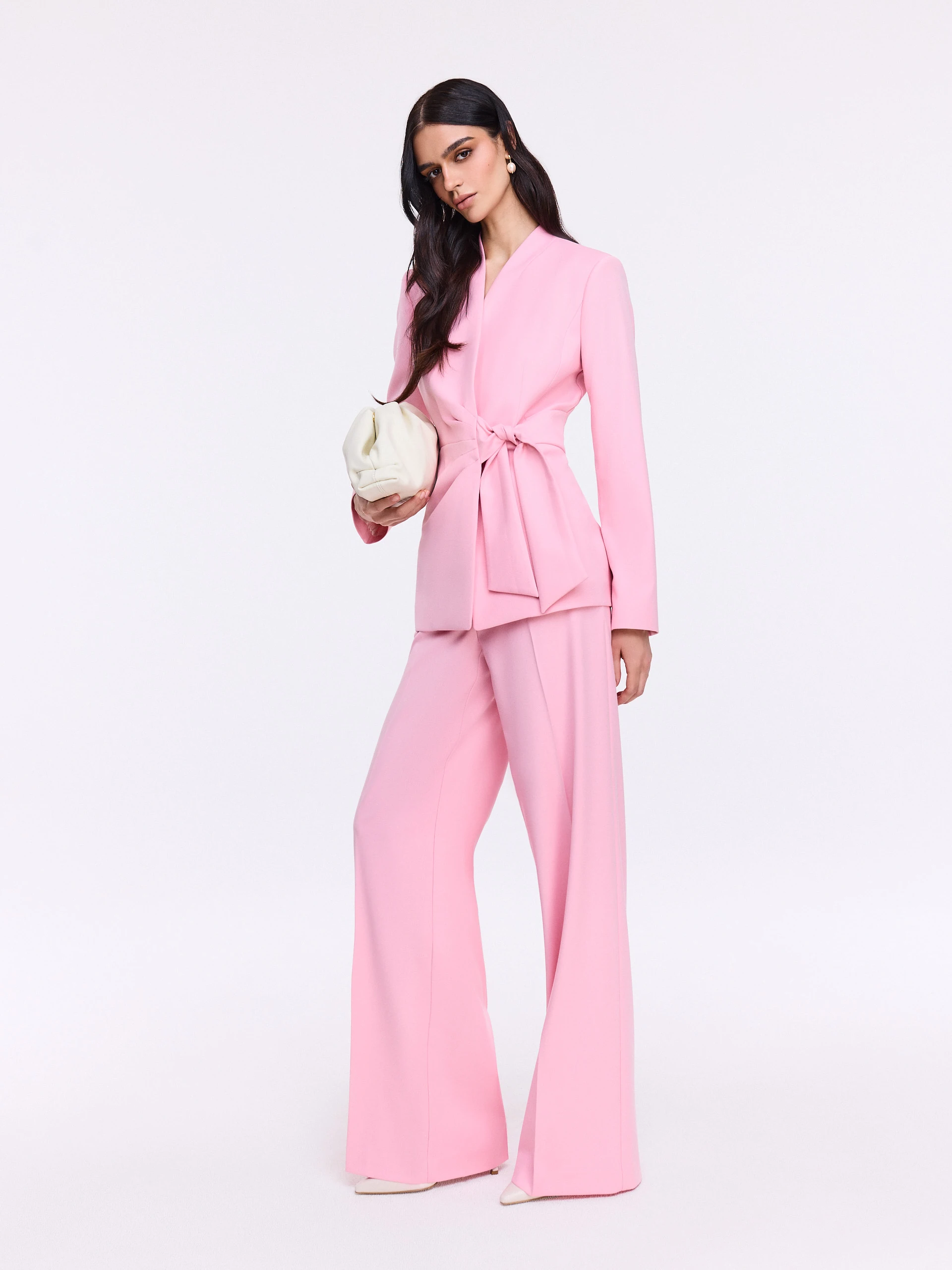 Unique pink jacket with a tie at the waist