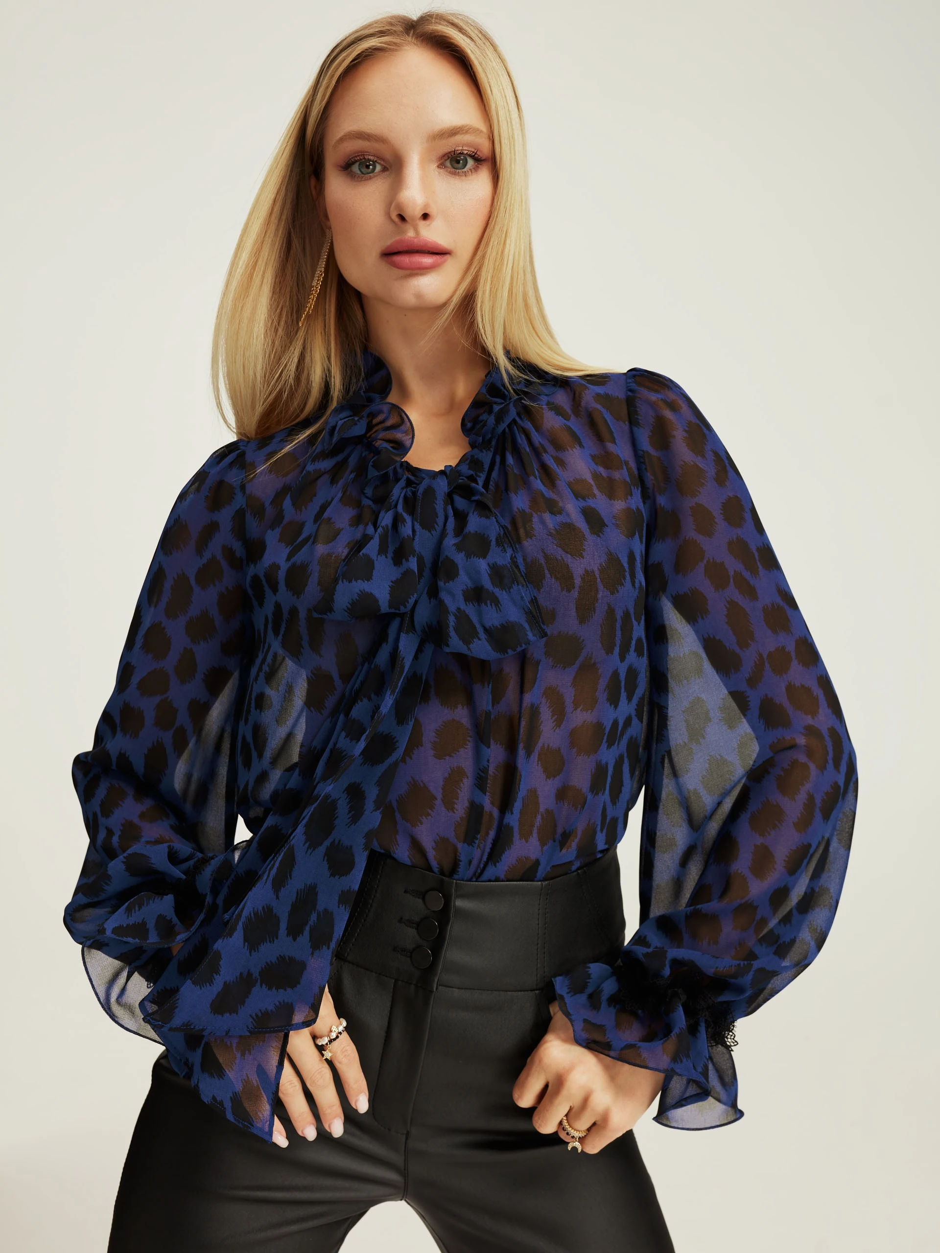 Black imitation leather trousers