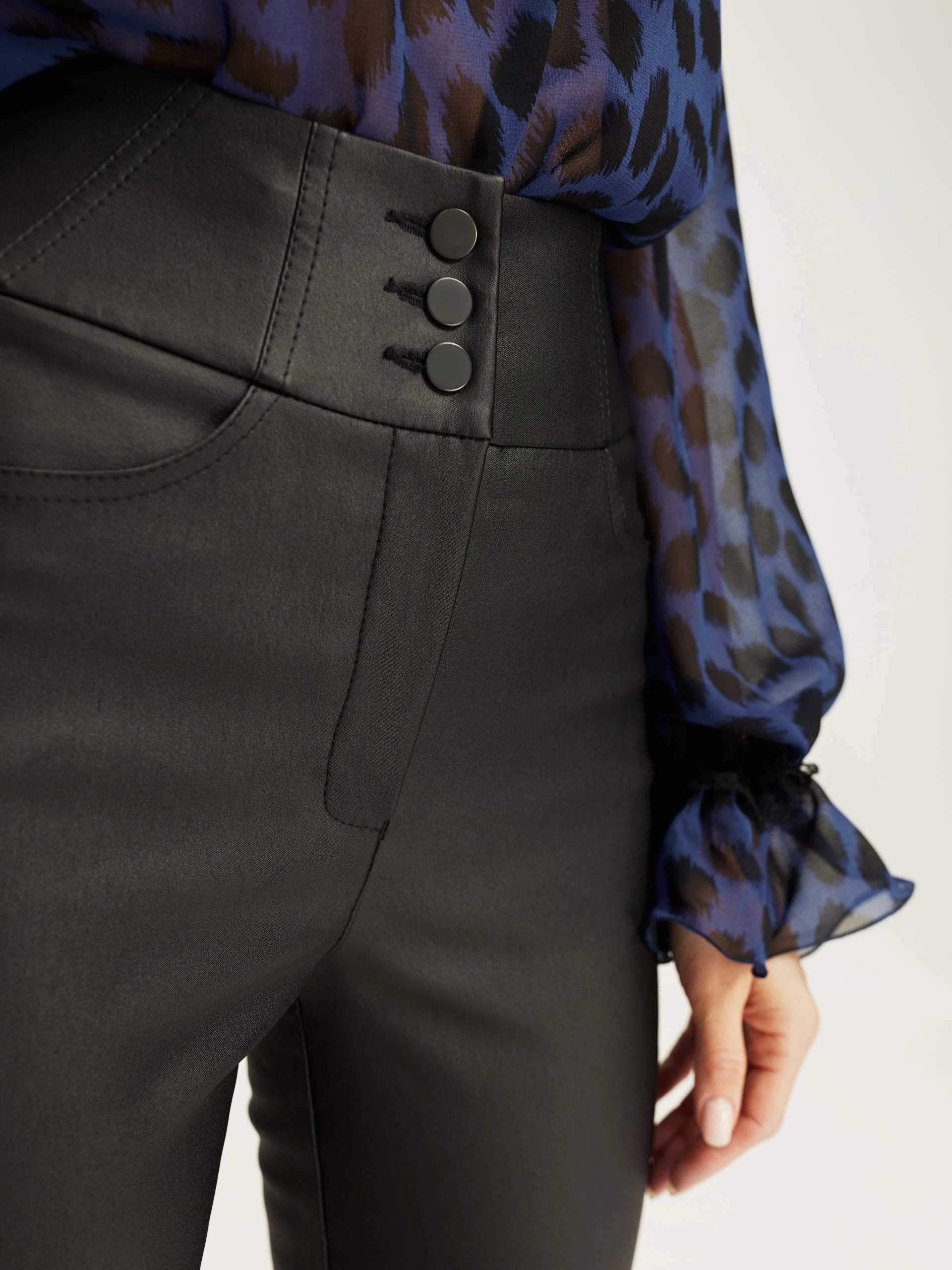 Black imitation leather trousers