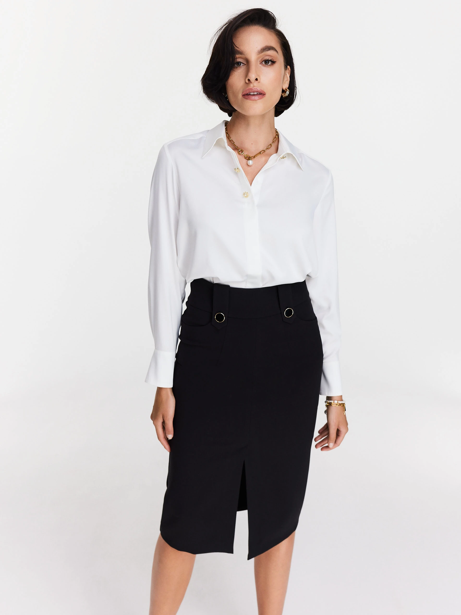 Elegant white shirt with decorative buttons
