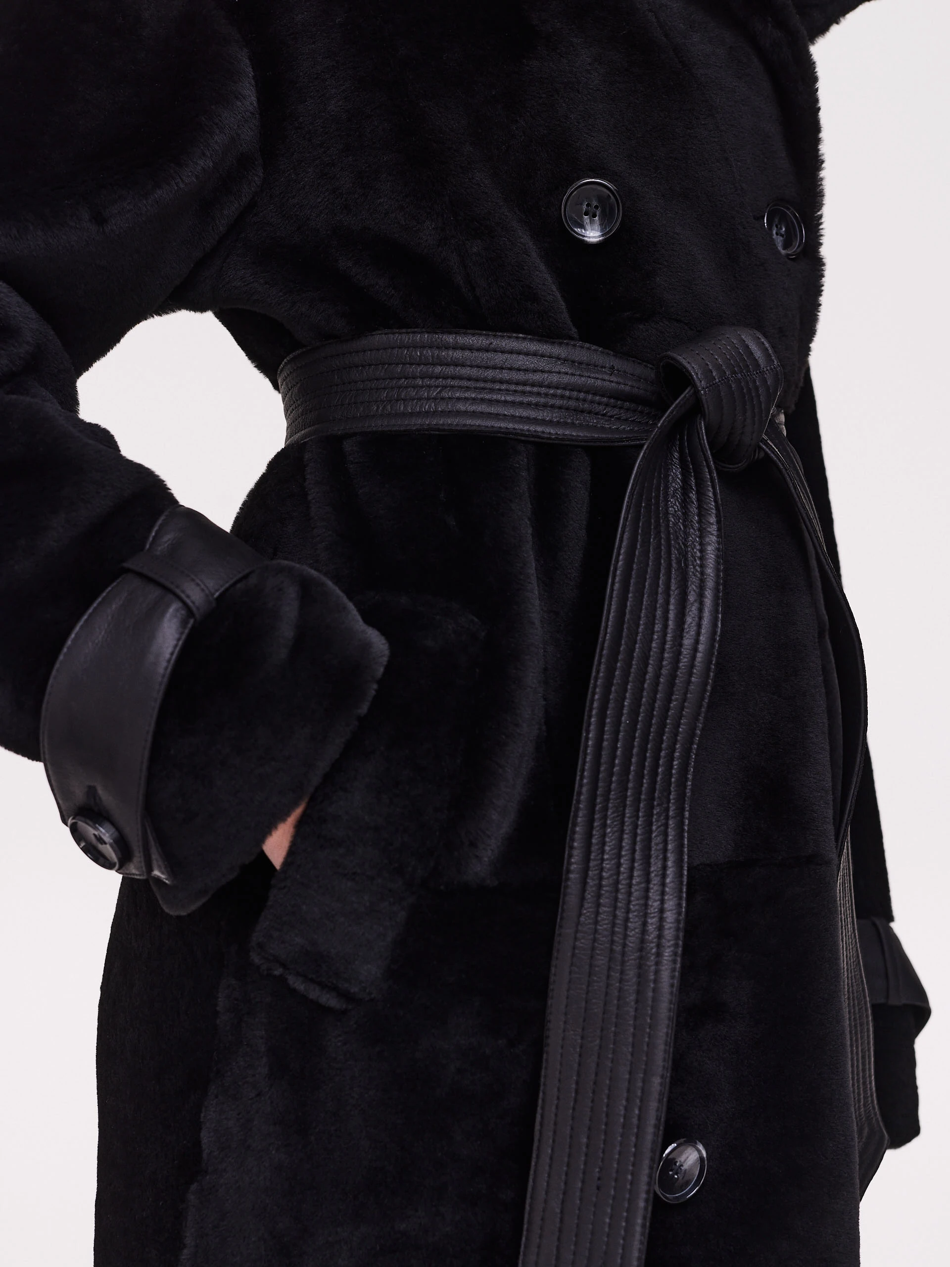Black genuine leather sheepskin coat with double-breasted closure