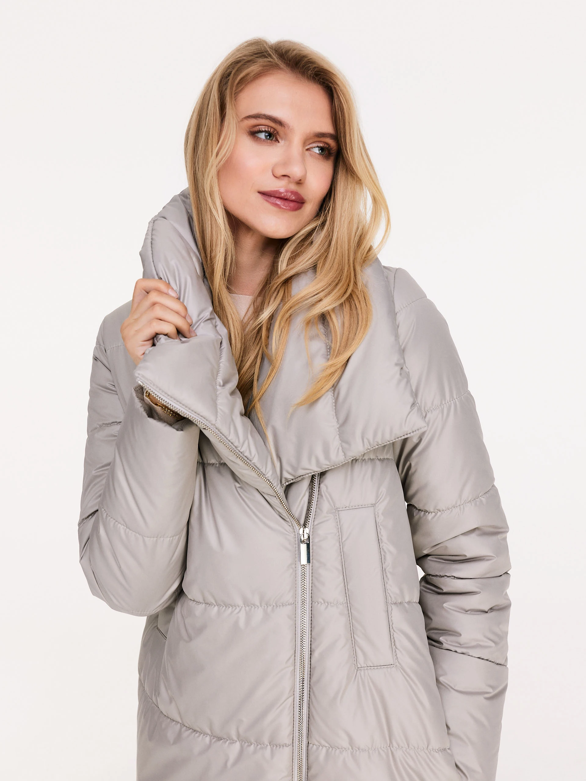 Long quilted coat in beige color