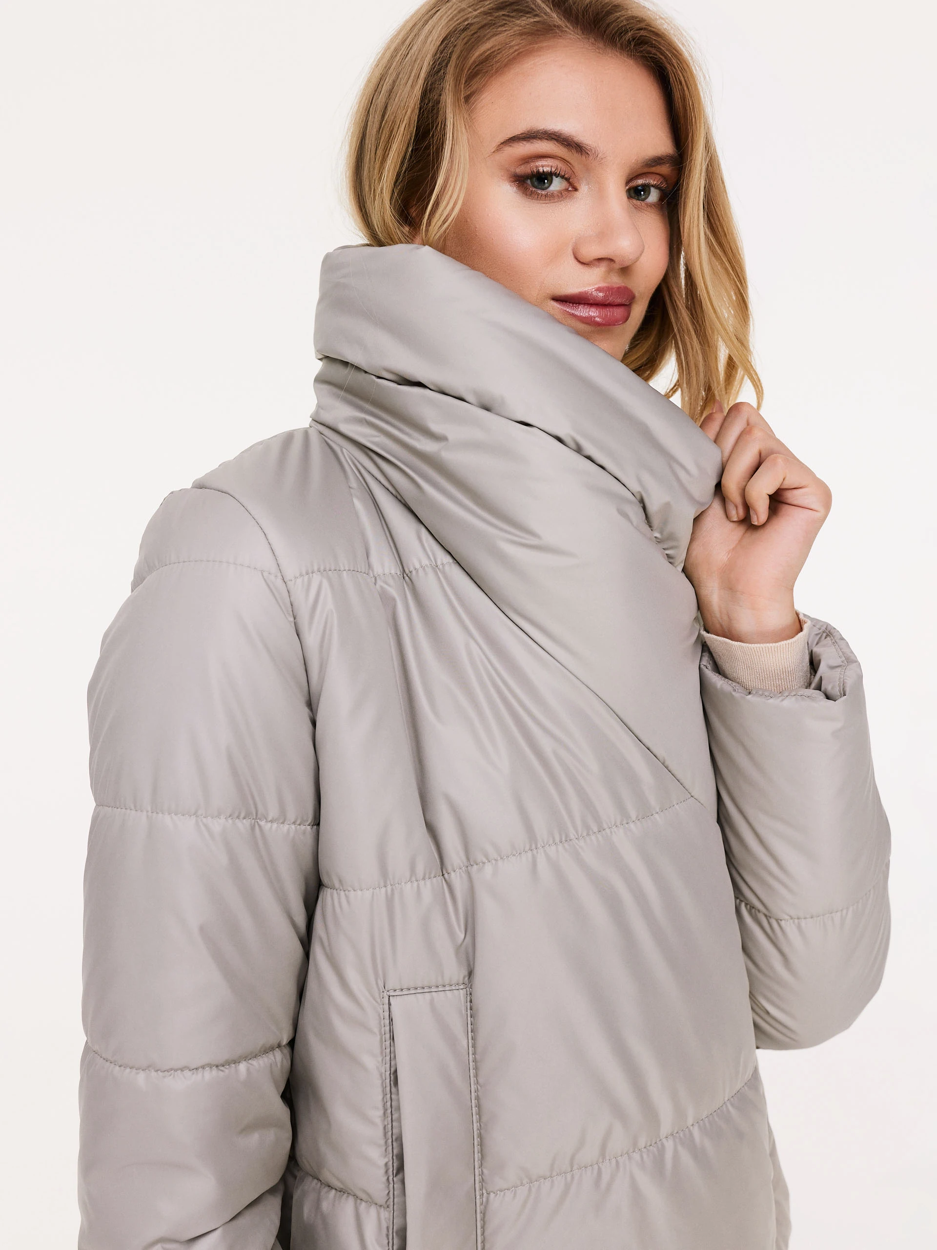 Long quilted coat in beige color