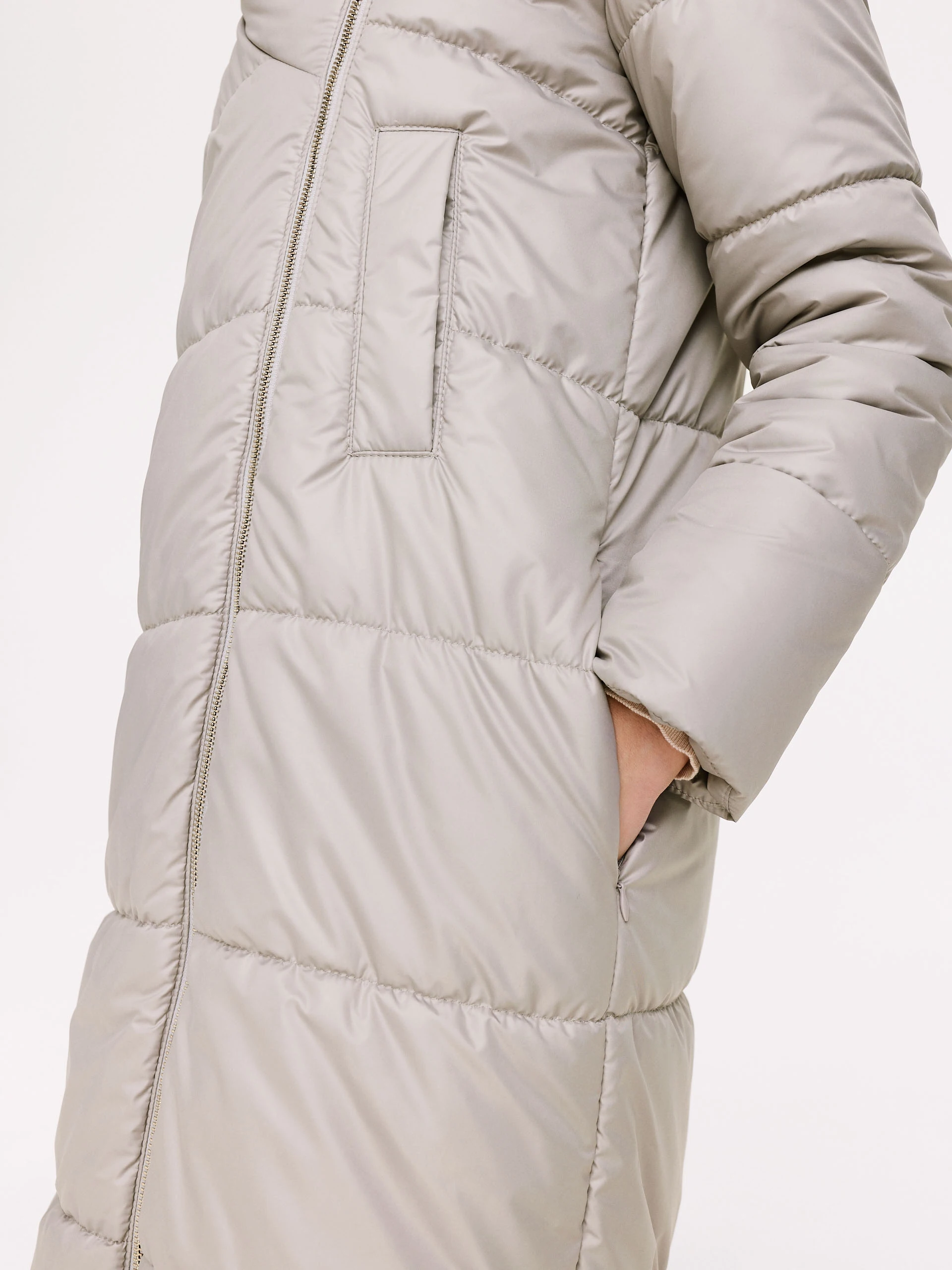 Long quilted coat in beige color