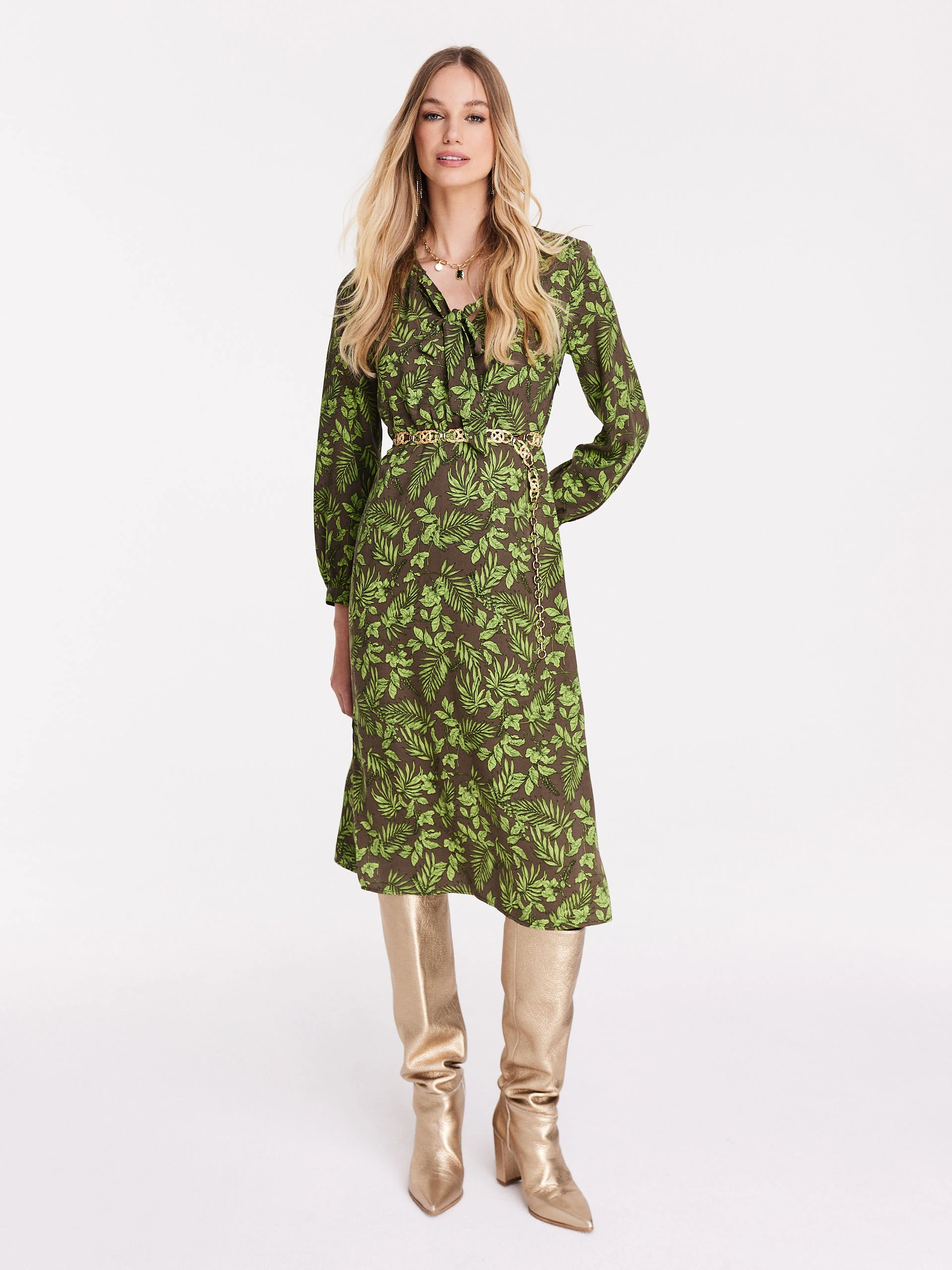 Brown dress with green leaf pattern