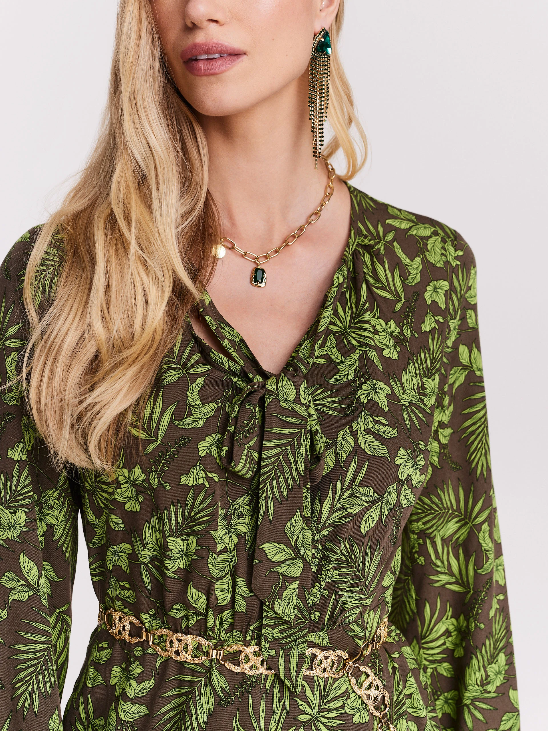 Brown dress with green leaf pattern